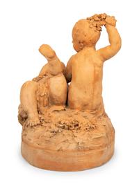 A Continental Terra Cotta Figural Group in the Style of Clodion — 20TH CENTURY