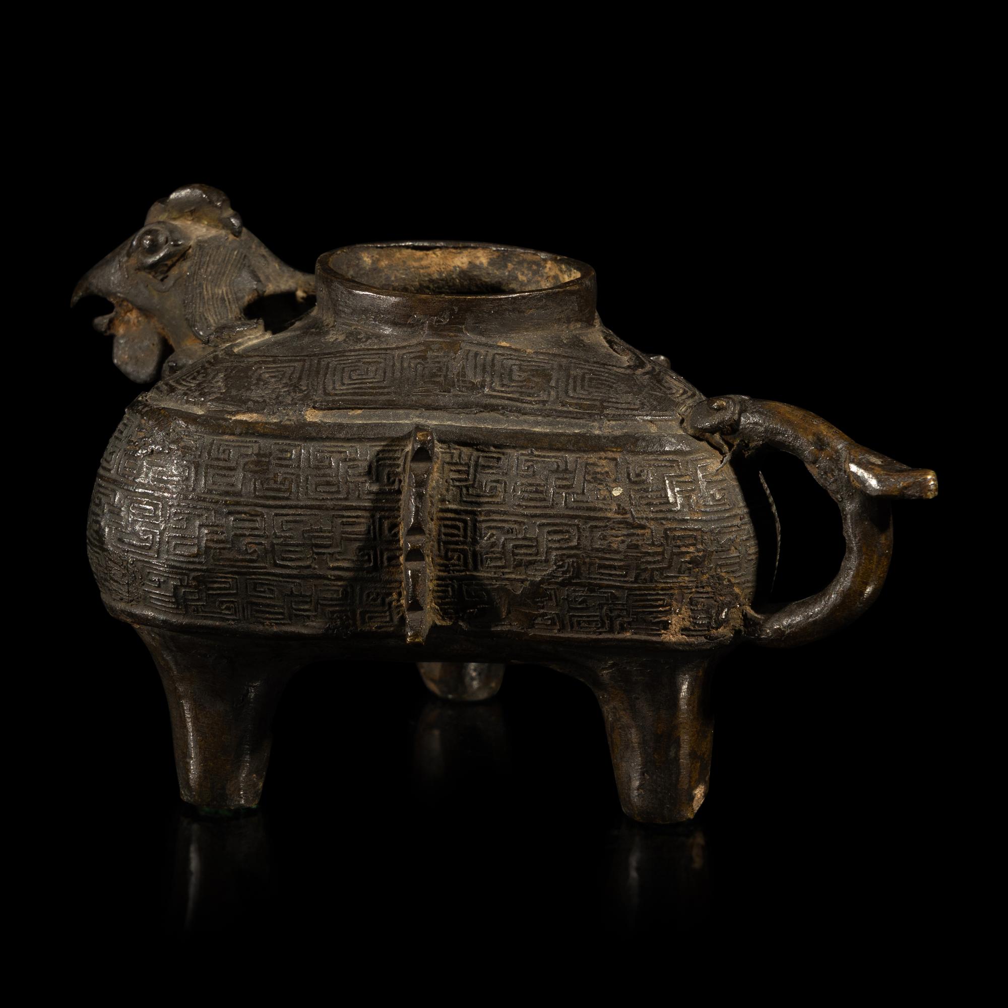 A Chinese Archaic Style Bronze He Vessel, 15th-16th Century — 明 銅仿古天鷄三足盉