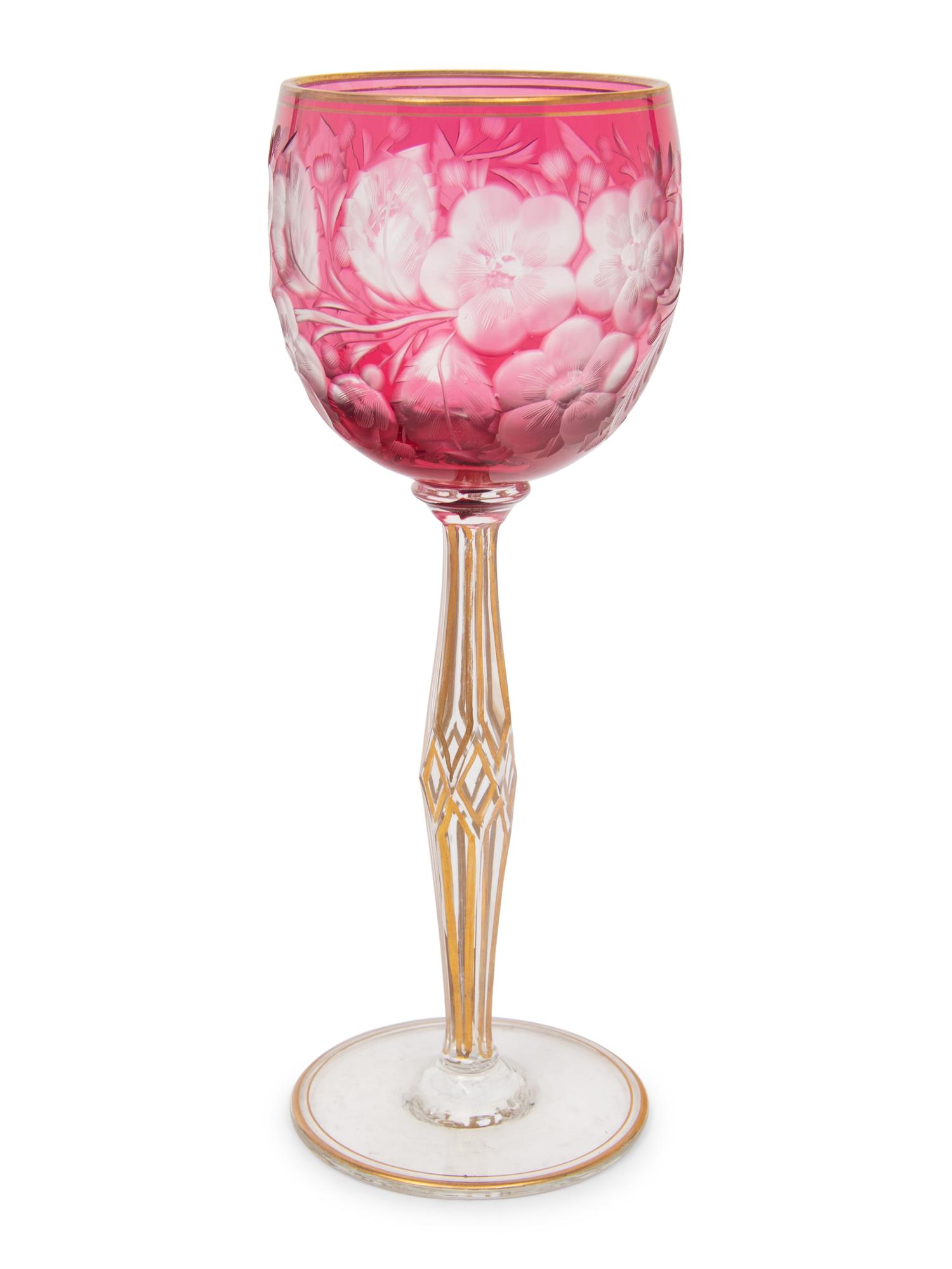 A Set of Twelve Bohemian Etched and Gilt Decorated Red Cut-to-Clear Wine Stems