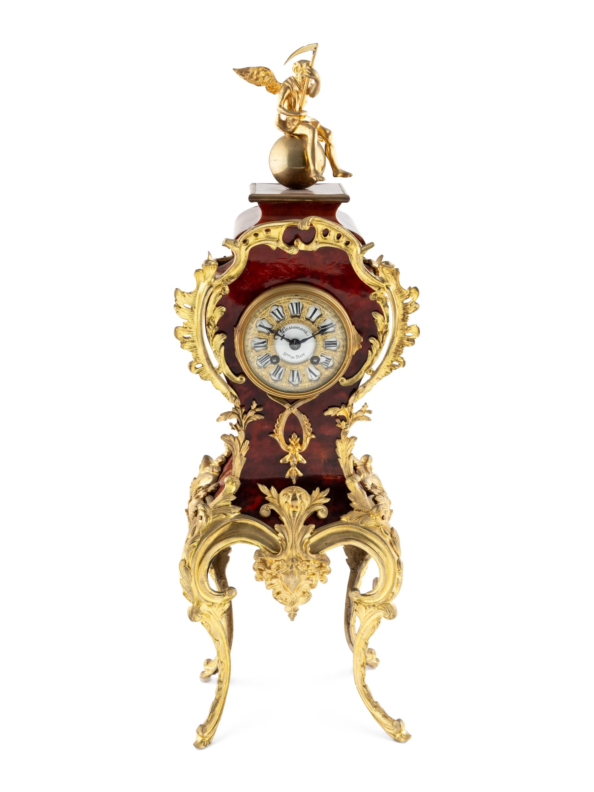 A Louis XV Style Gilt Metal and Faux Tortoise Shell Mantel Clock