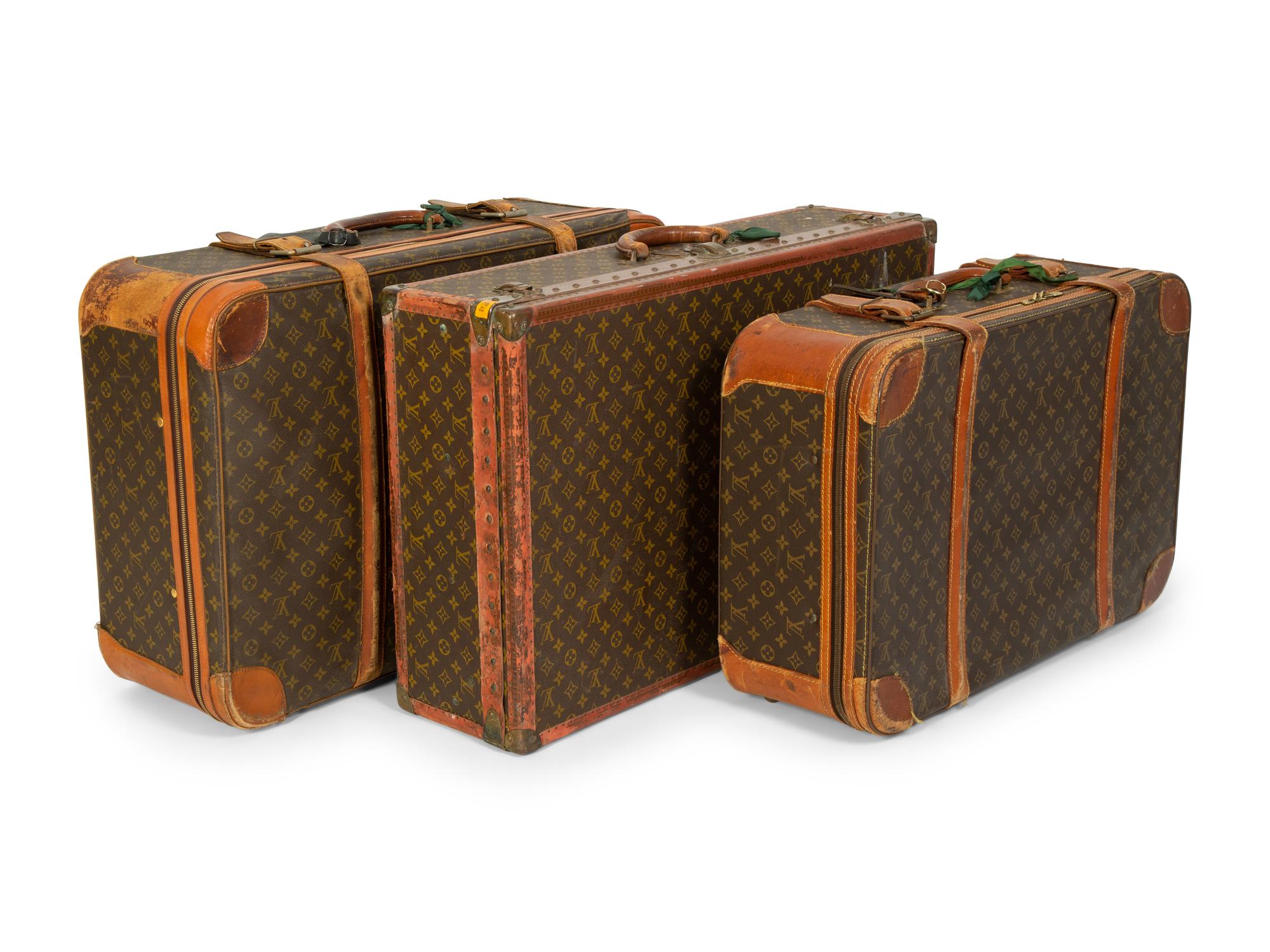 Three Louis Vuitton Travel Cases — 20TH CENTURY