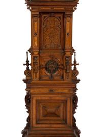 A German Carved Walnut and Marquetry Tall Case Clock