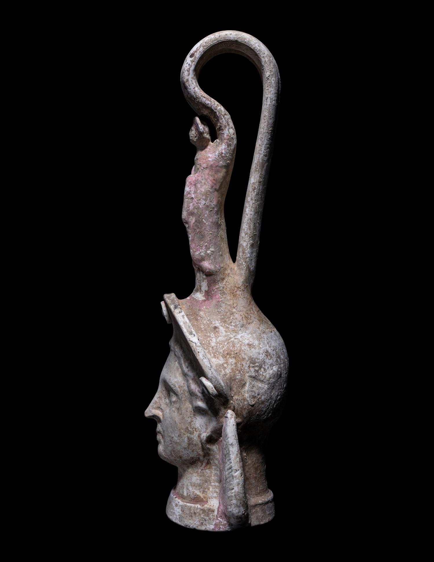 A Canosan Pottery Figural Oinochoe