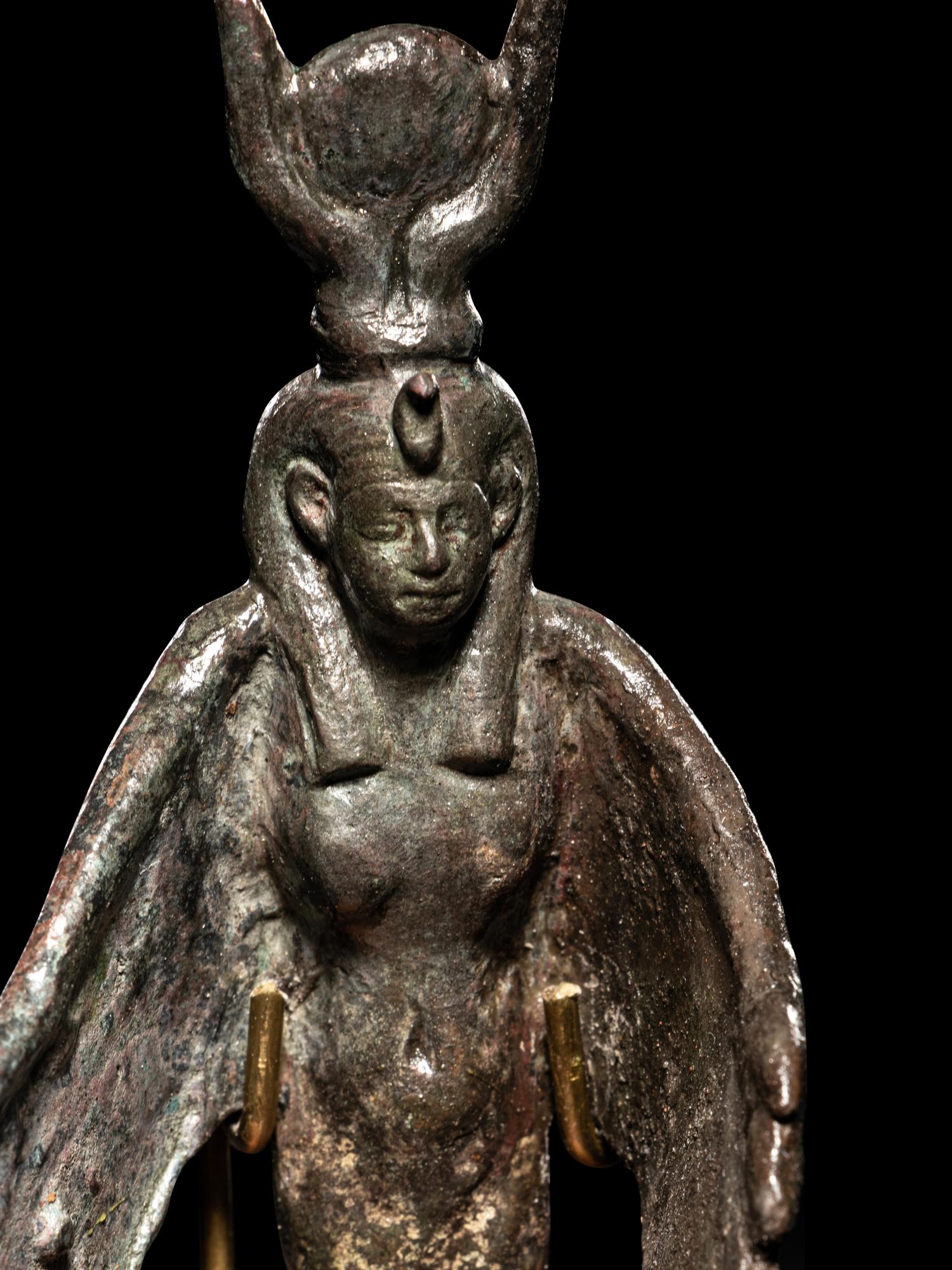 An Egyptian Bronze Winged Isis