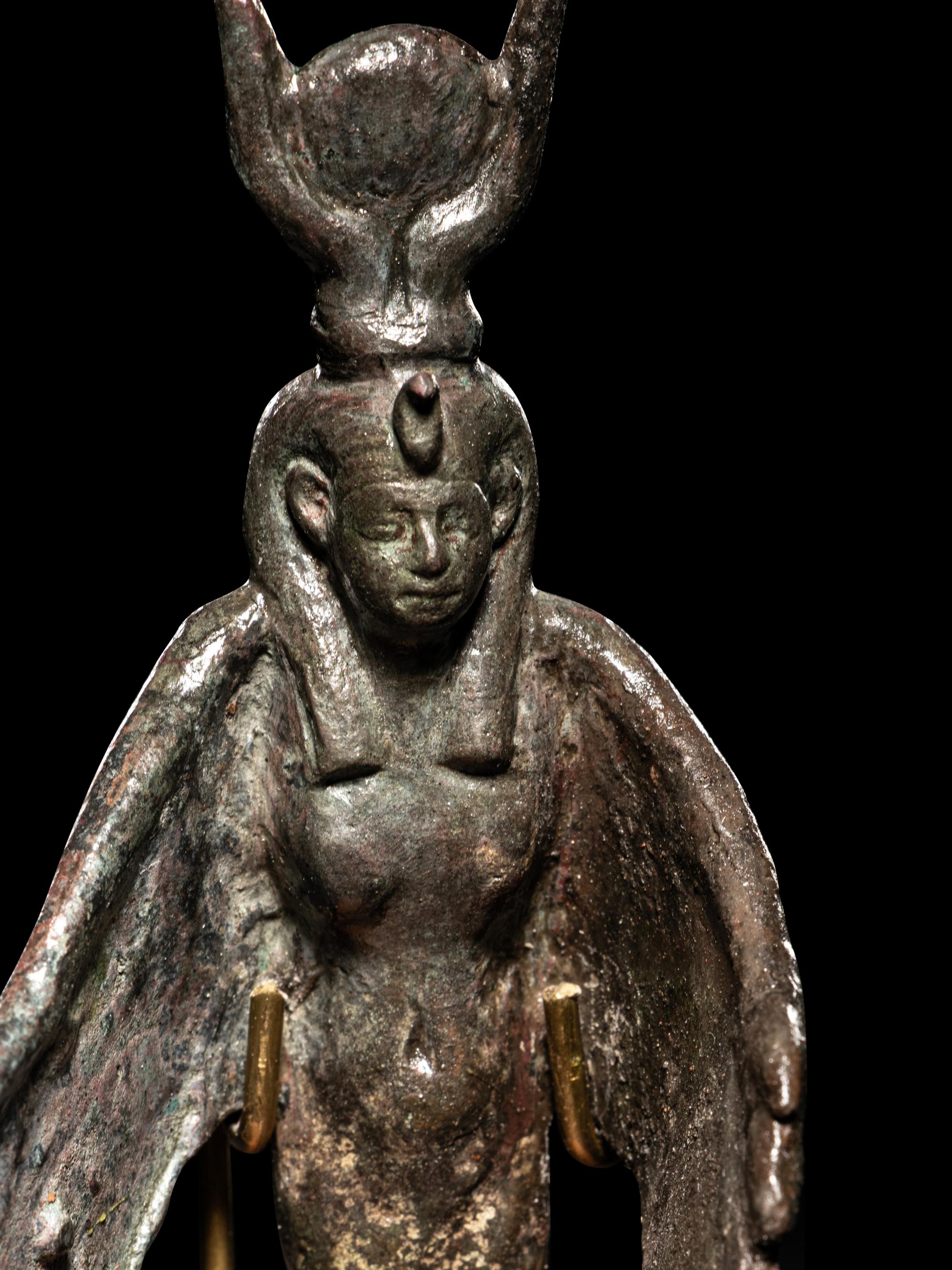 An Egyptian Bronze Winged Isis