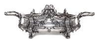 A Neoclassical Silver-Plate Jardiniere, 19th/20th Century, of oval handled form with ribbon tied festoon and foliate decoration.
