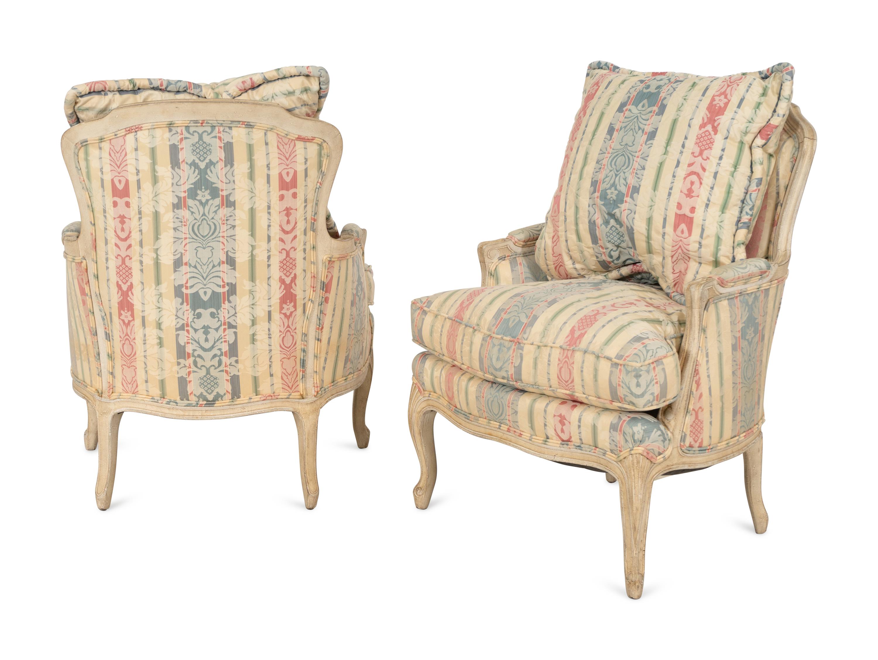 A Pair of Louis XV Style Cream-Painted Bergères