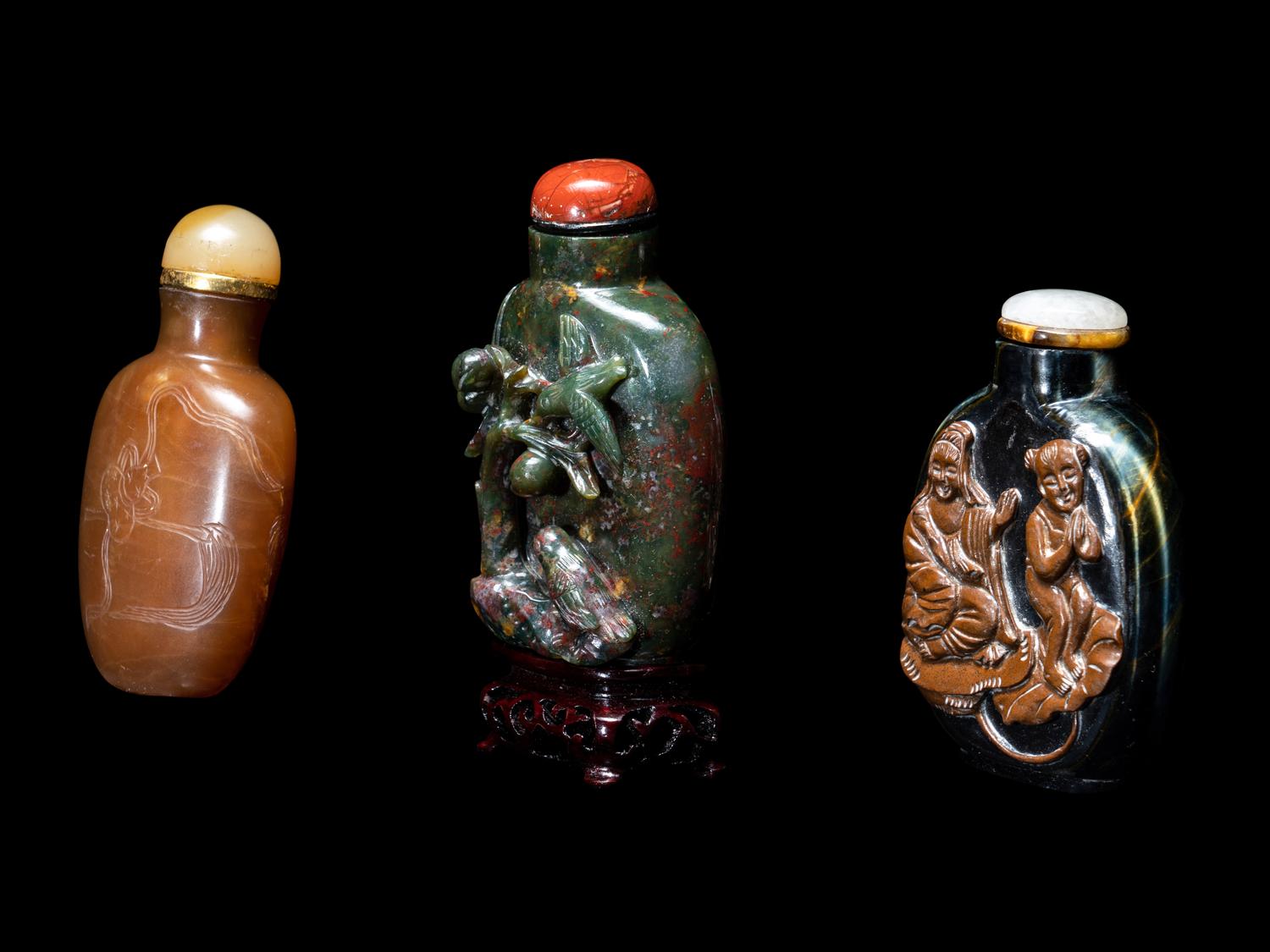 Three Chinese Carved Hardstone Snuff Bottles