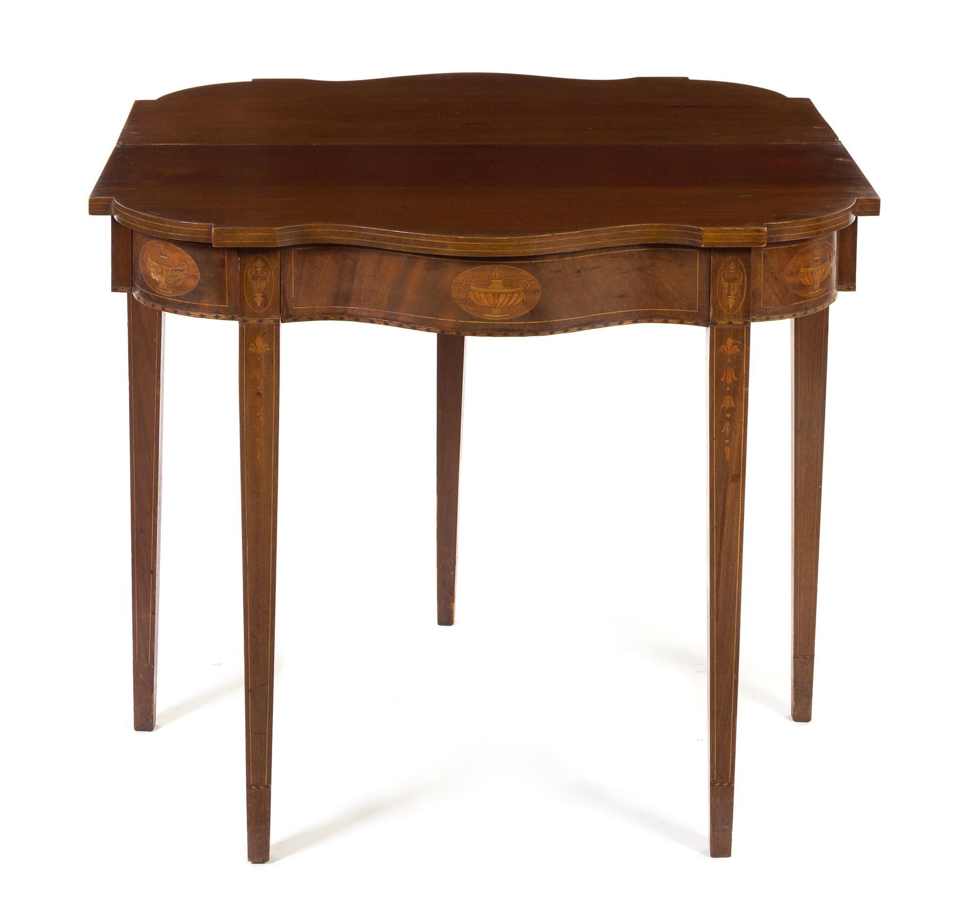 A Hepplewhite Style Marquetry Mahogany Flip-Top Games Table Height 30 x width 34 inches.