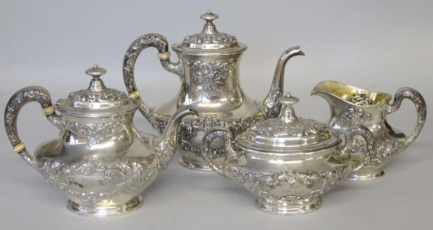 Four piece sterling silver repoussé coffee and tea service gorham corporation, providence, ri, early 20th century