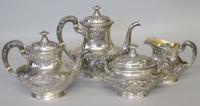 Four piece sterling silver repoussé coffee and tea service gorham corporation, providence, ri, early 20th century