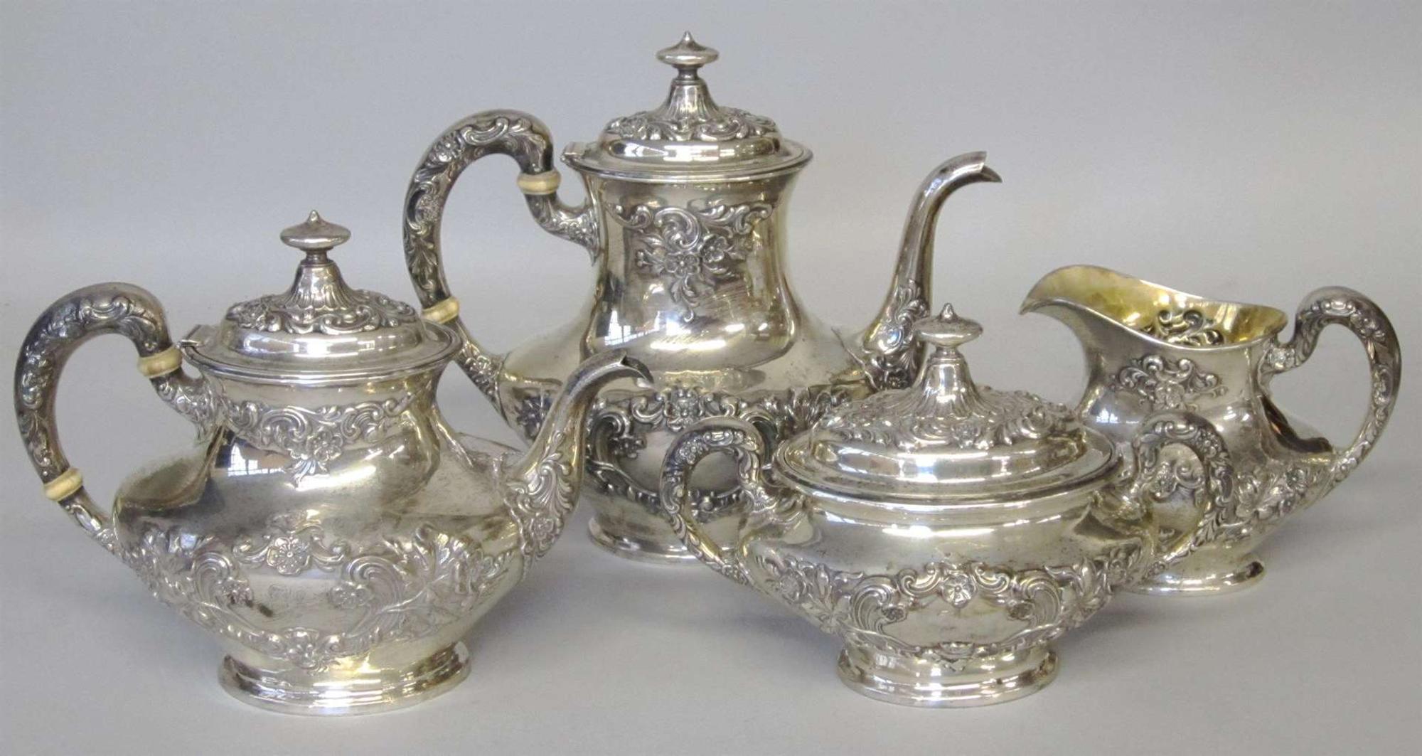 Four piece sterling silver repoussé coffee and tea service gorham corporation, providence, ri, early 20th century