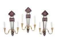 A Set of Three Mirrored, Red Glass and Brass Two-Light Sconces