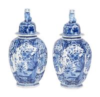 A Pair of Delft Blue and White Covered Jars