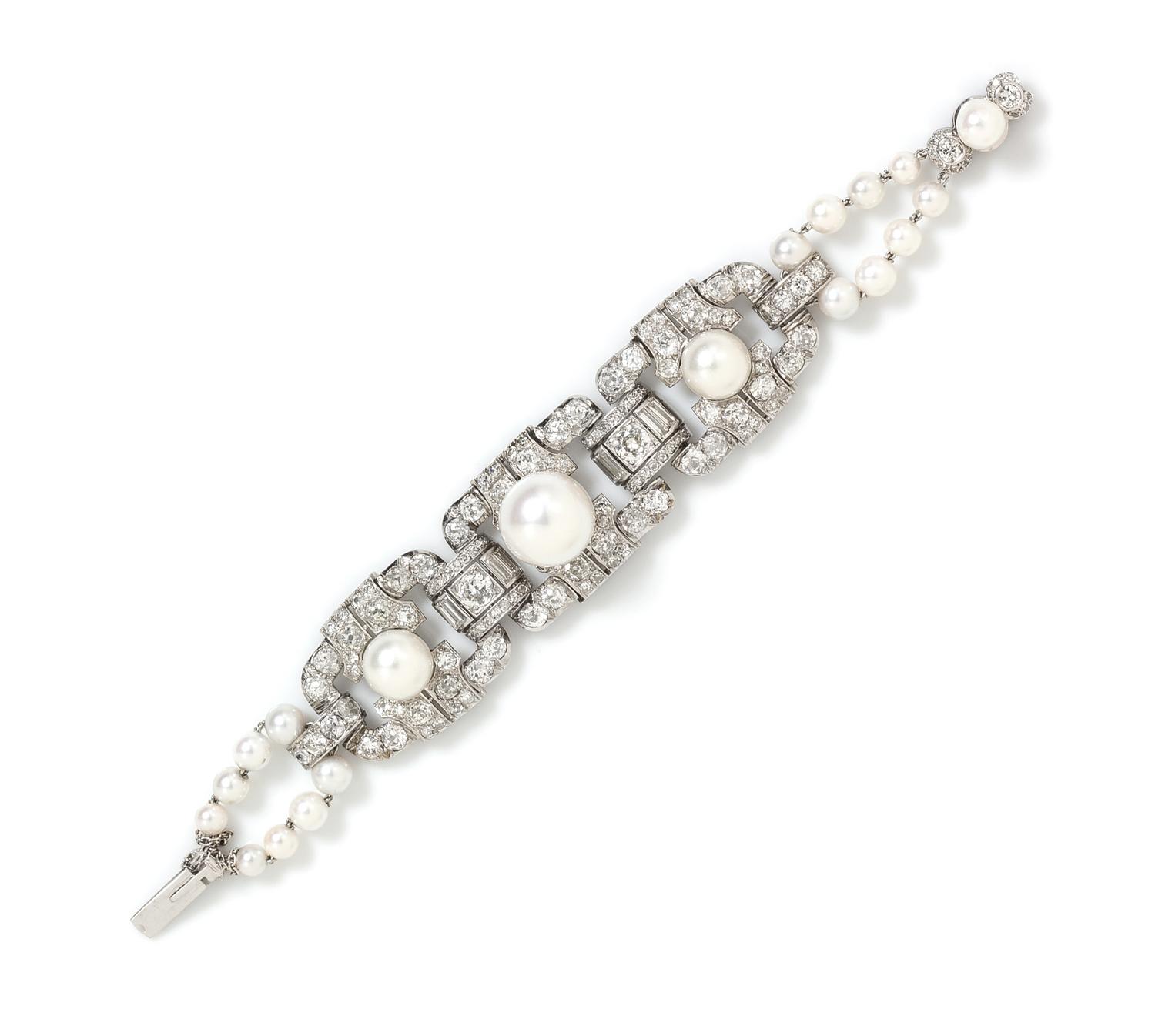 A Platinum, 18 Karat White Gold, Cultured South Sea Pearl, Pearl and Diamond Bracelet, French, 30.90 dwts.