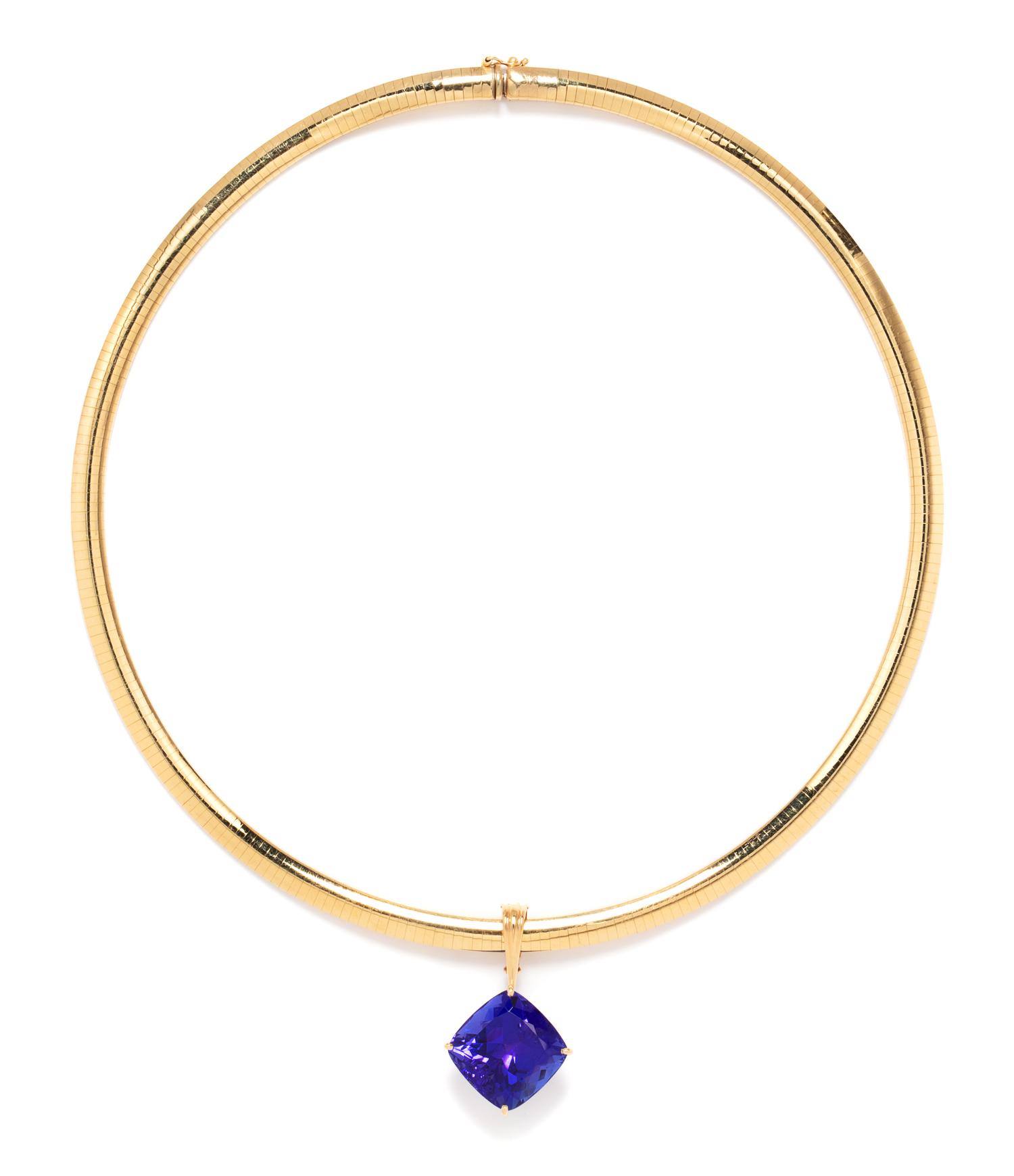 A 14 Karat Yellow Gold and Tanzanite Pendant/Necklace, 32.00 dwts.