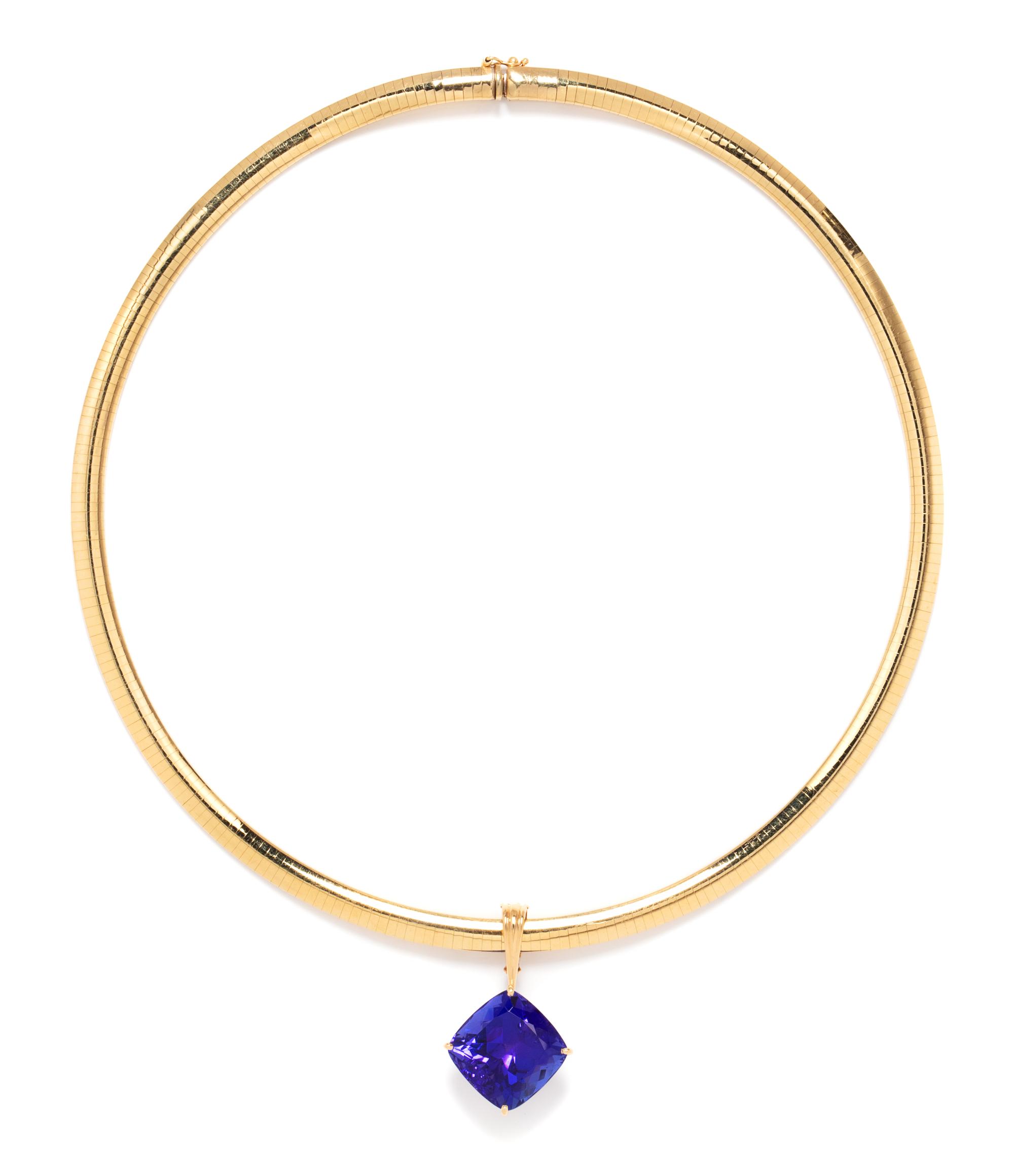 A 14 Karat Yellow Gold and Tanzanite Pendant/Necklace, 32.00 dwts.
