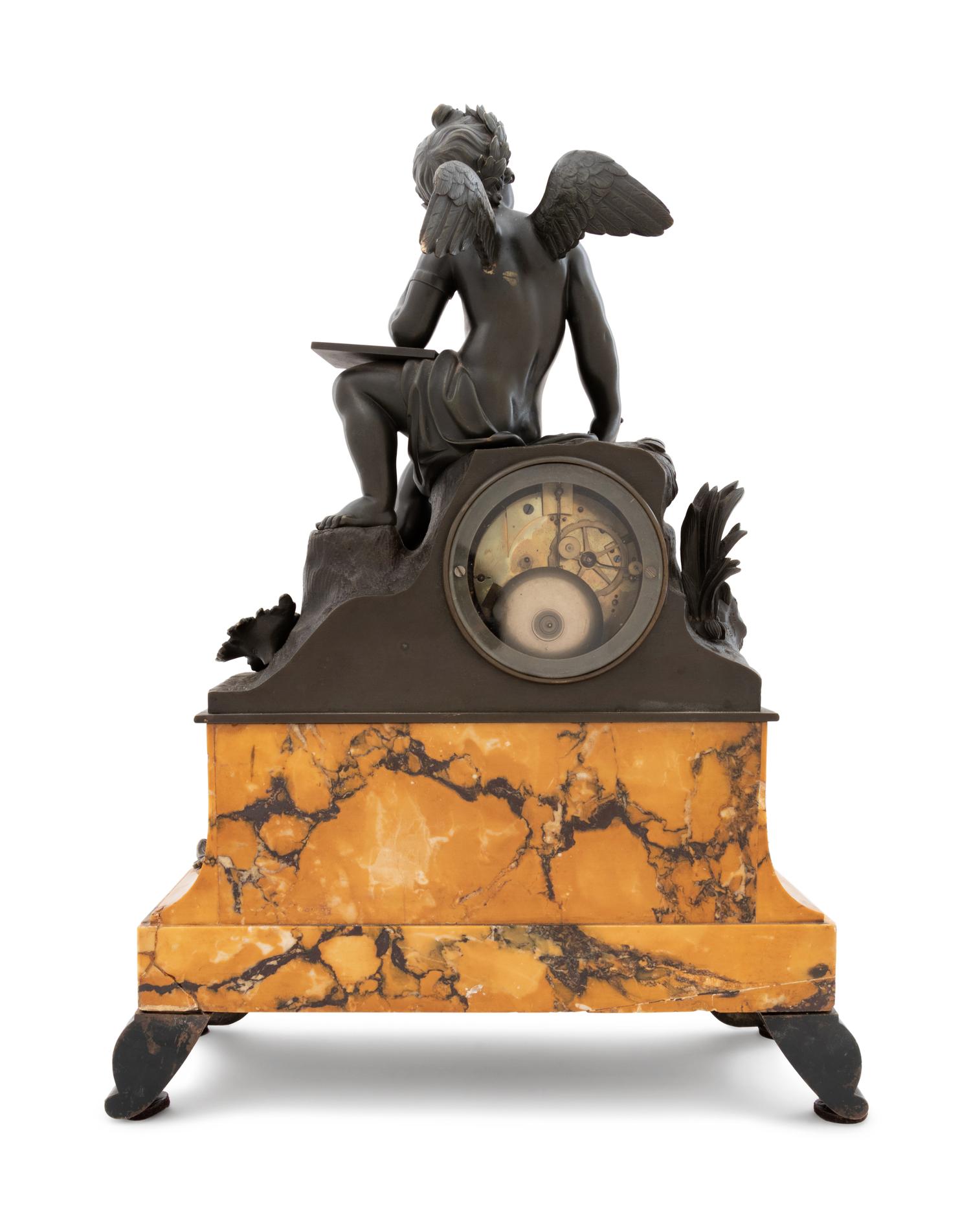 A French Bronze and Sienna Marble Figural Mantel Clock