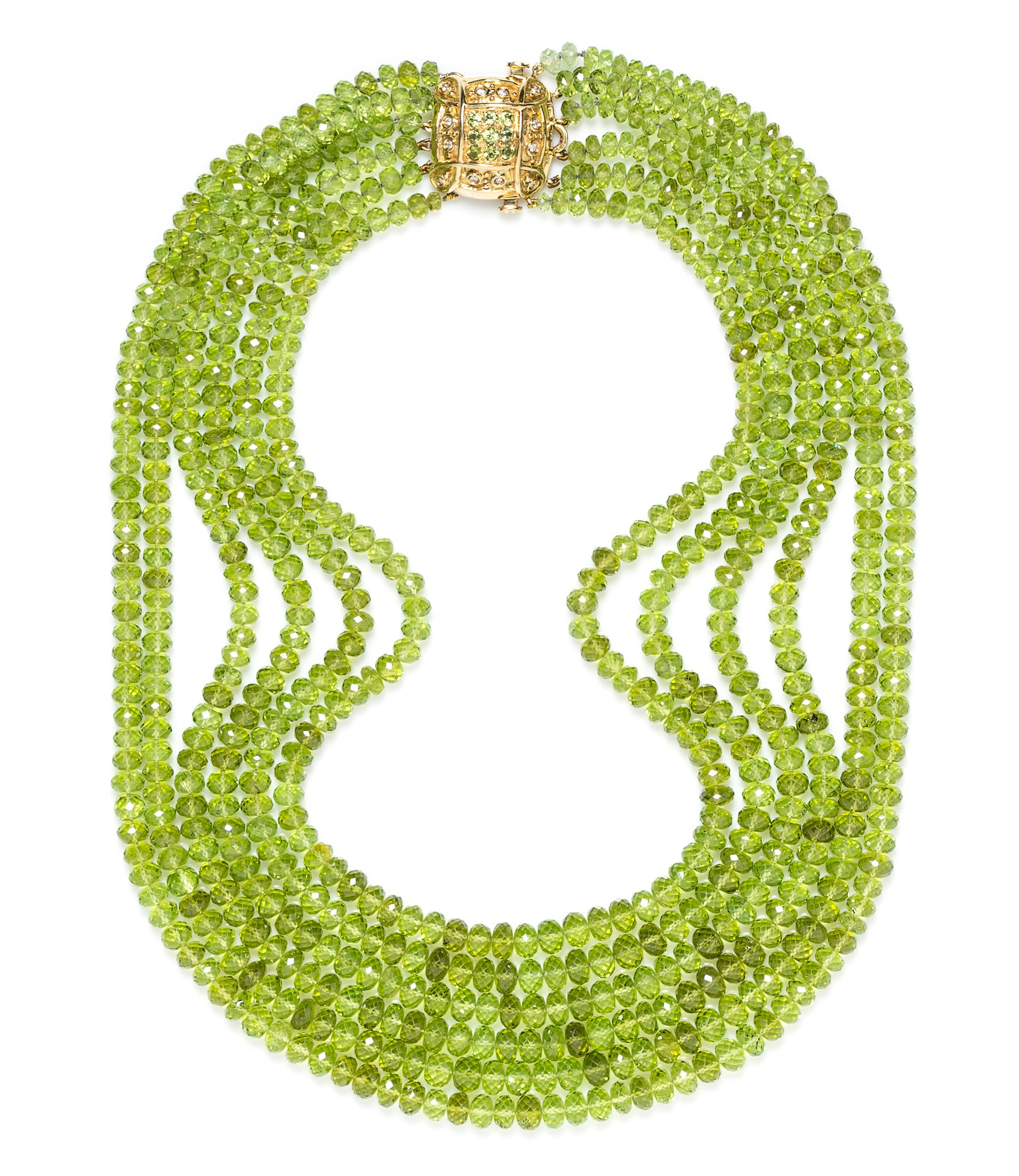 An 18 Karat Yellow Gold, Diamond and Peridot Multi Strand Necklace, Laura Munder,