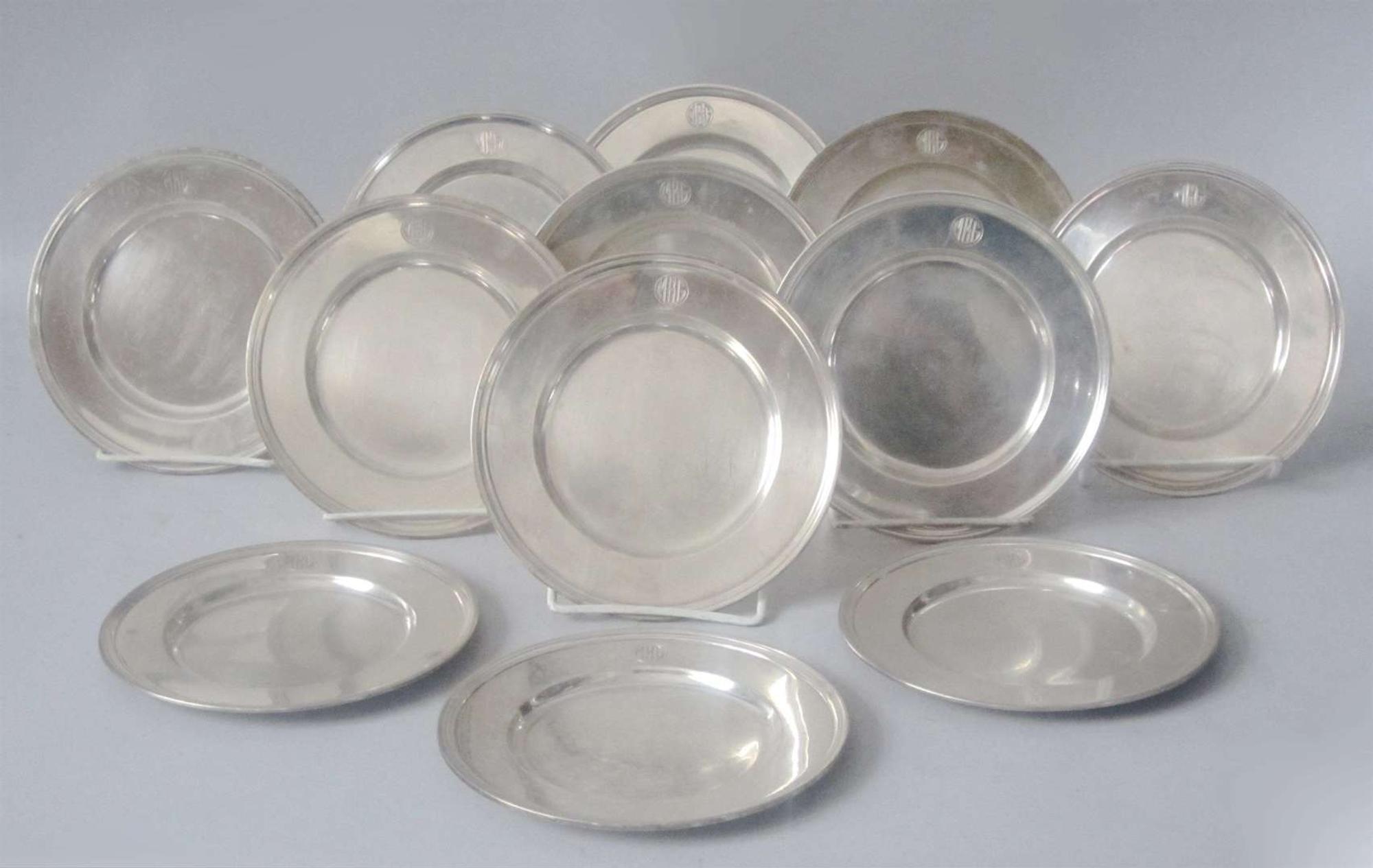 Twelve sterling silver bread plates tiffany & co., new york, ny, 20th century