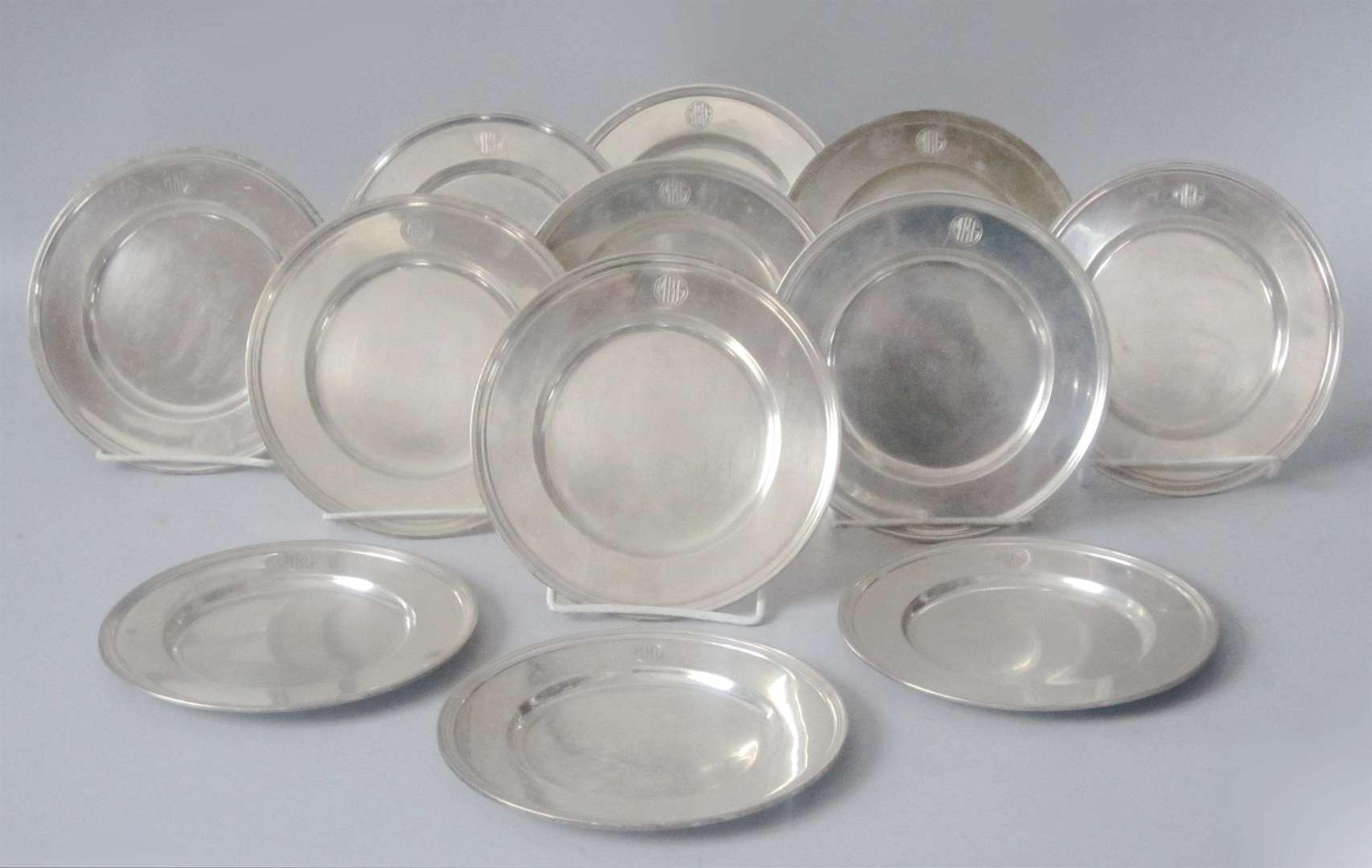 Twelve sterling silver bread plates tiffany & co., new york, ny, 20th century