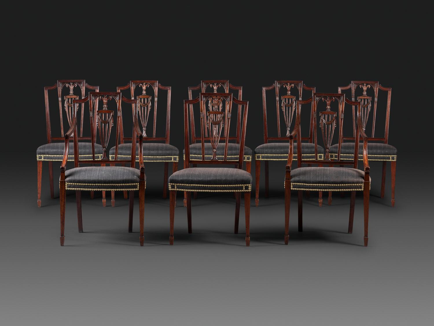 A Set of Eight Federal Carved Mahogany Dining Chairs
