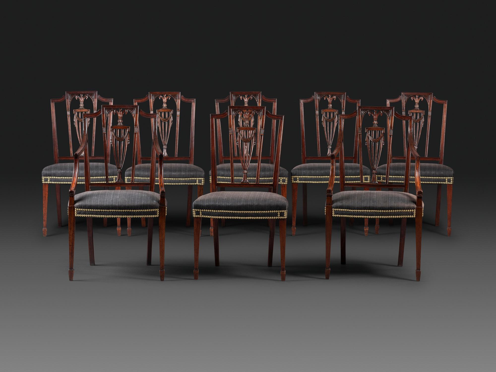 A Set of Eight Federal Carved Mahogany Dining Chairs
