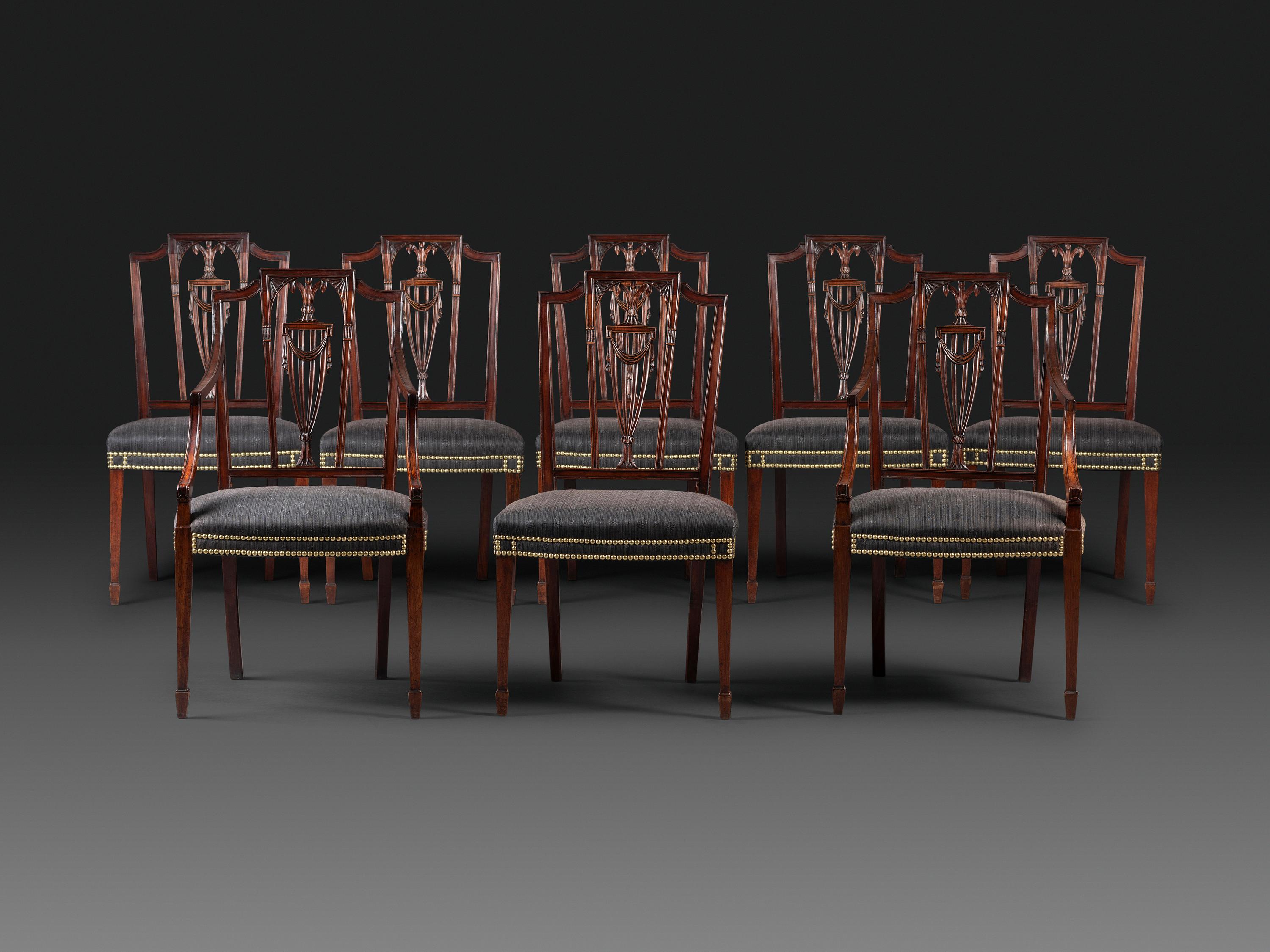 A Set of Eight Federal Carved Mahogany Dining Chairs
