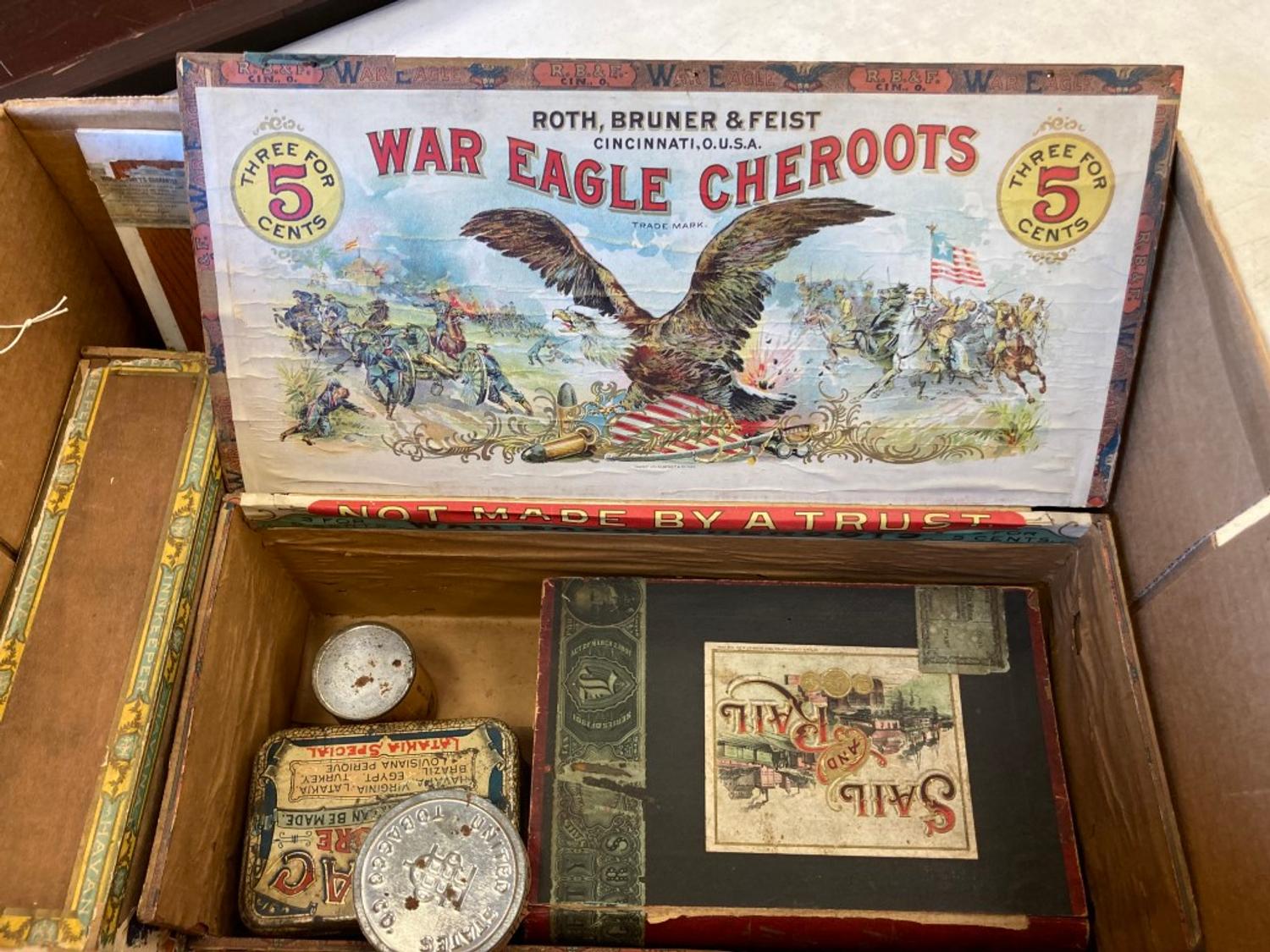 A Collection of Cigar Boxes and Tins
