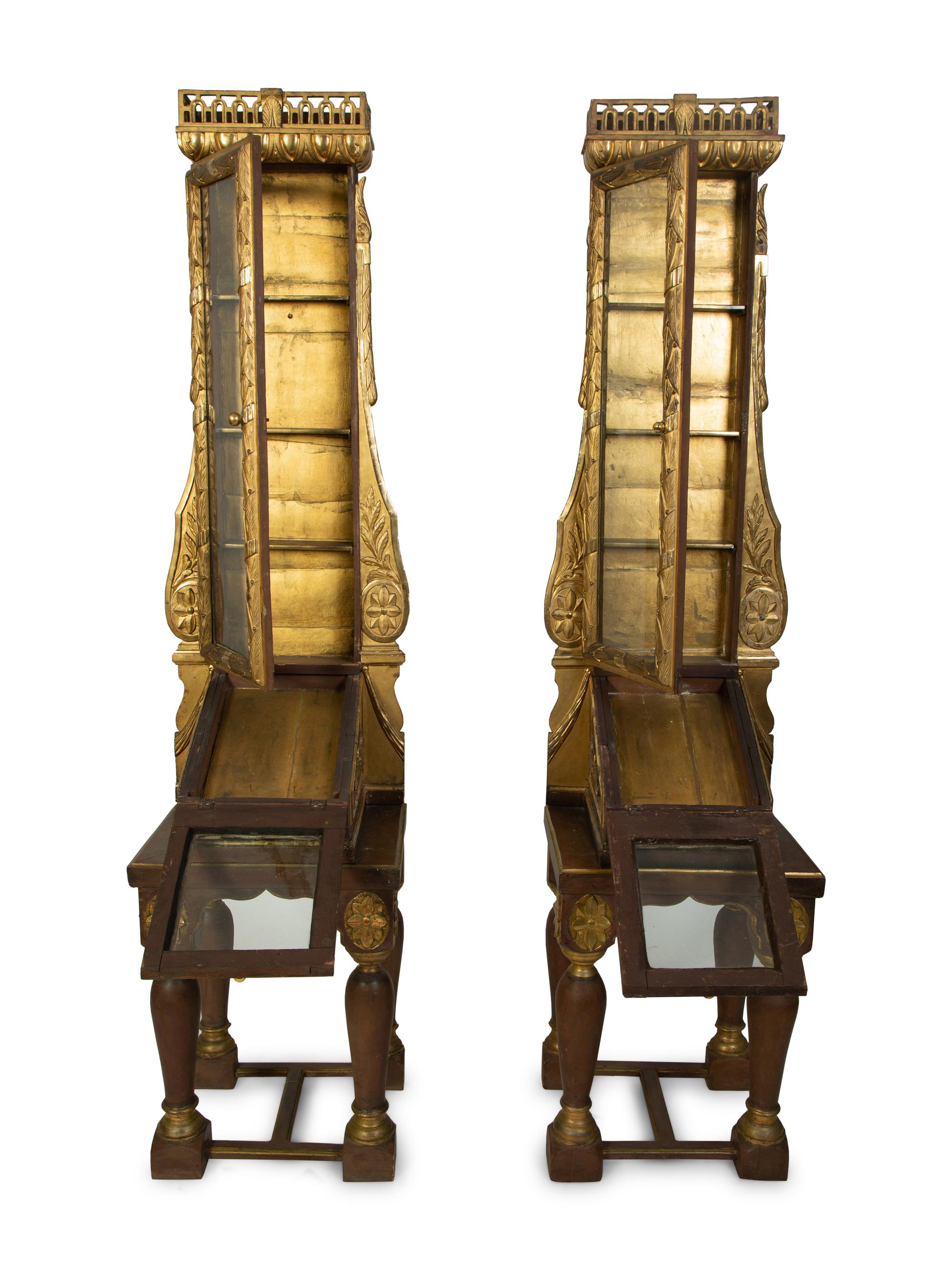 A Pair of Italian Giltwood Reliquary Cabinets — 18TH CENTURY