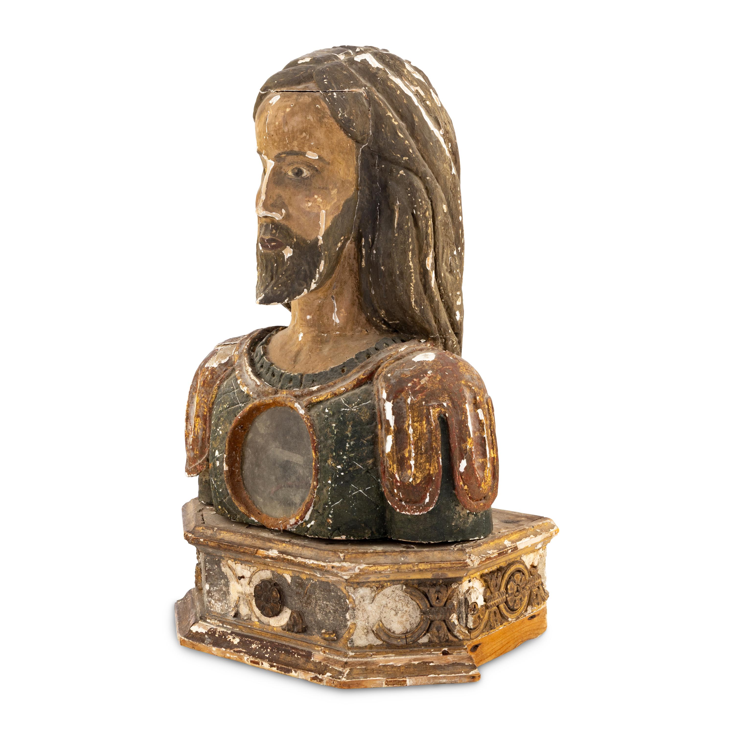 A Spanish Carved Wood and Polychrome Decorated Reliquary Bust