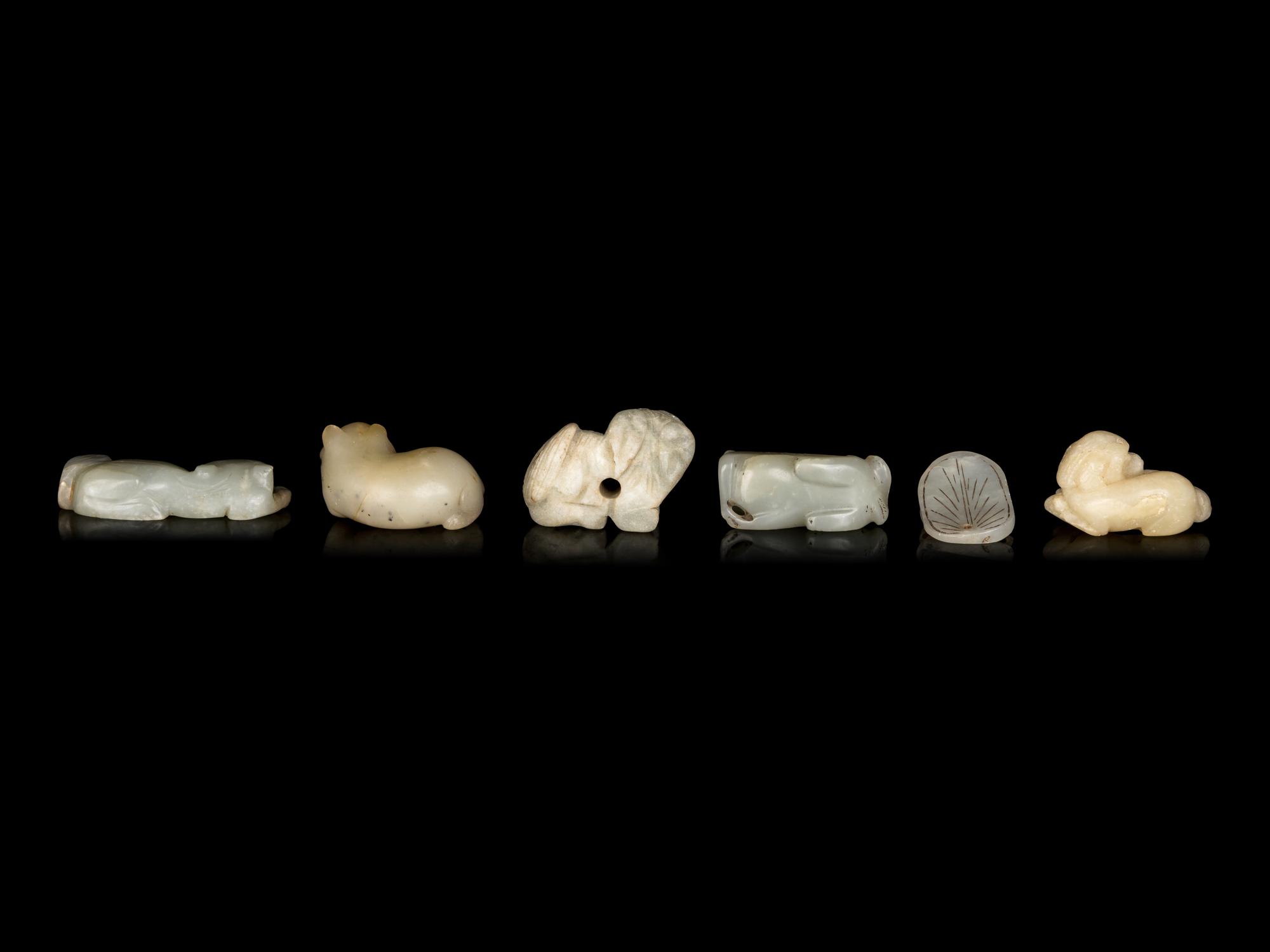 Six Celadon Jade Carvings of Mythical Beasts