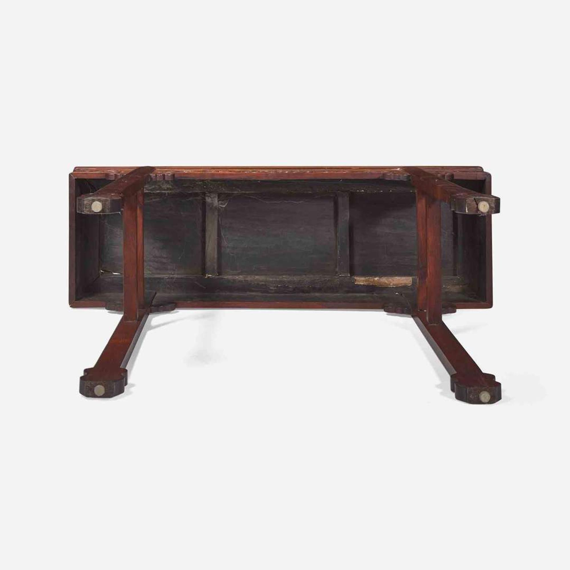 A Chinese carved hardwood side table