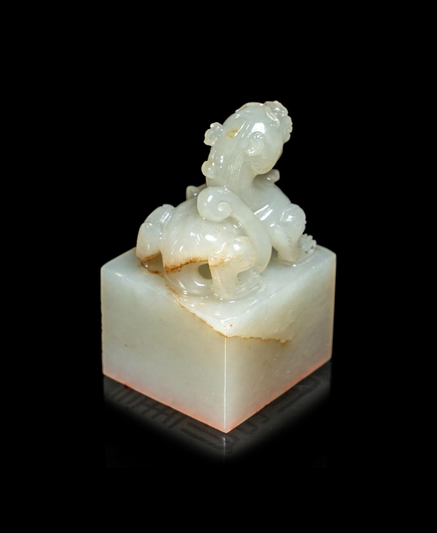 A Chinese Carved White Jade Seal