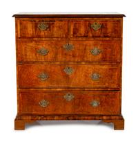 A George II Burl Walnut Chest of Drawers