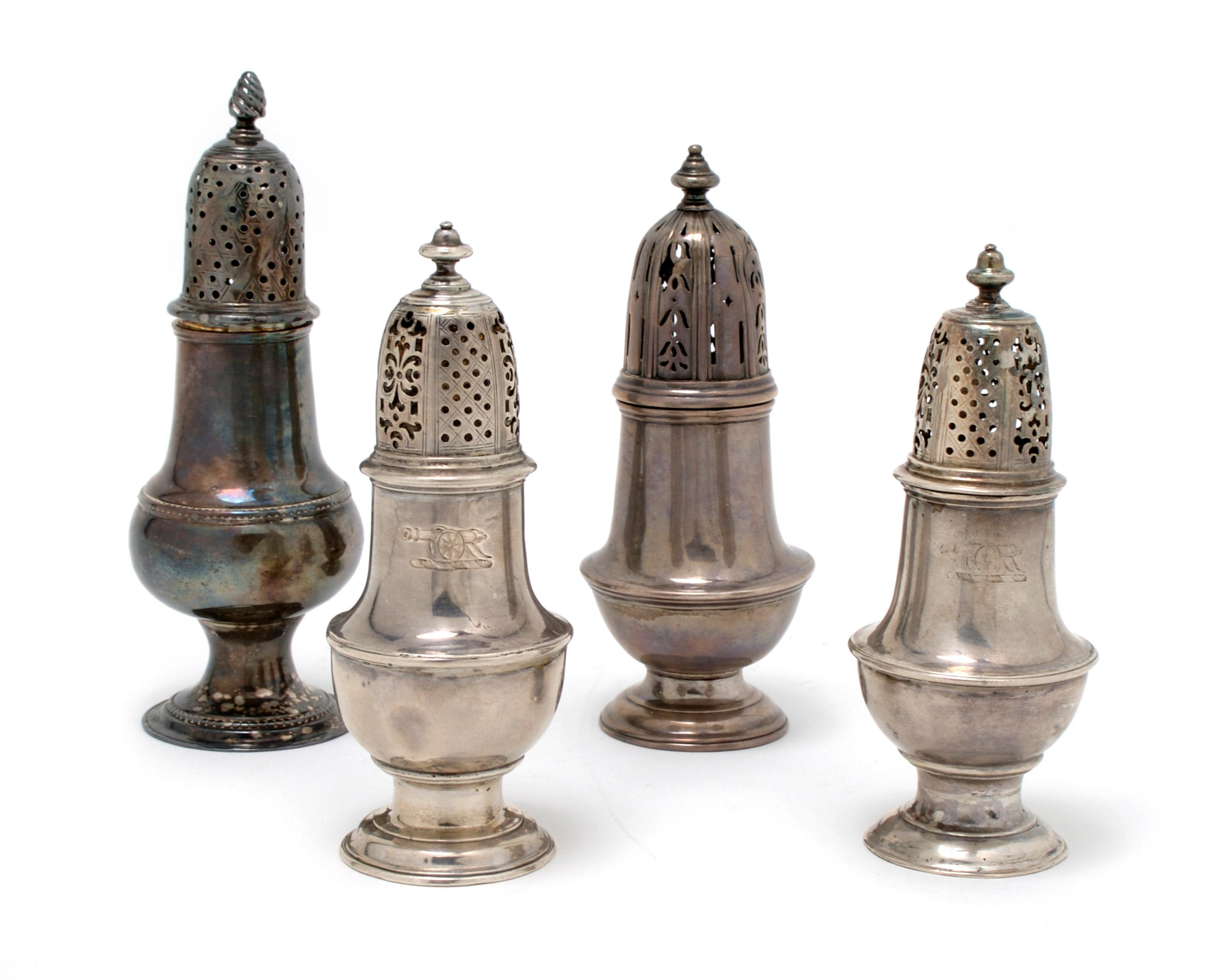 A Group of Four English Silver Casters, London, Height of tallest 5 5/8 inches.