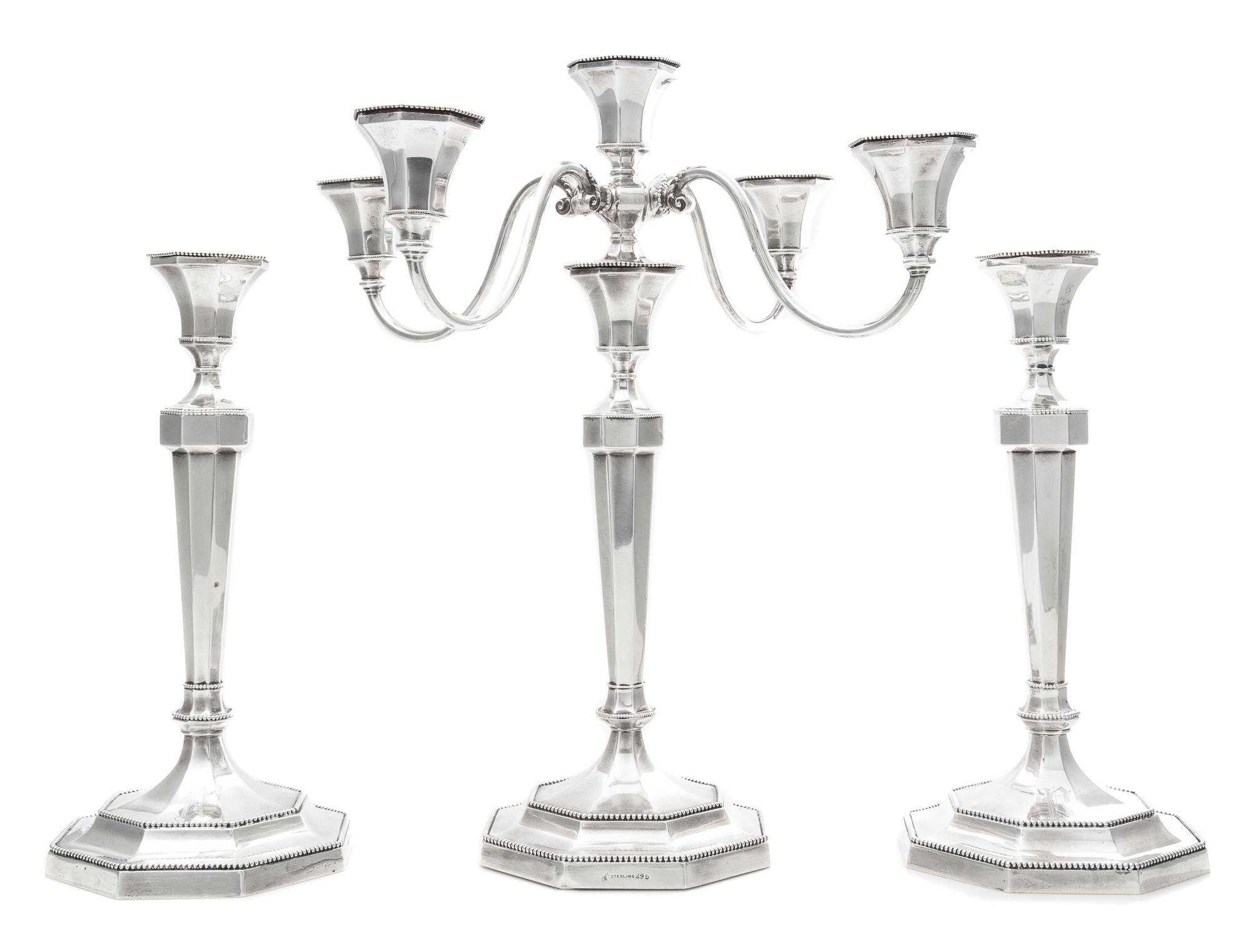Three American Silver Candlesticks, Lebolt & Co., Chicago, IL, 20th Century, each of paneled baluster form with beaded rims and a weigh