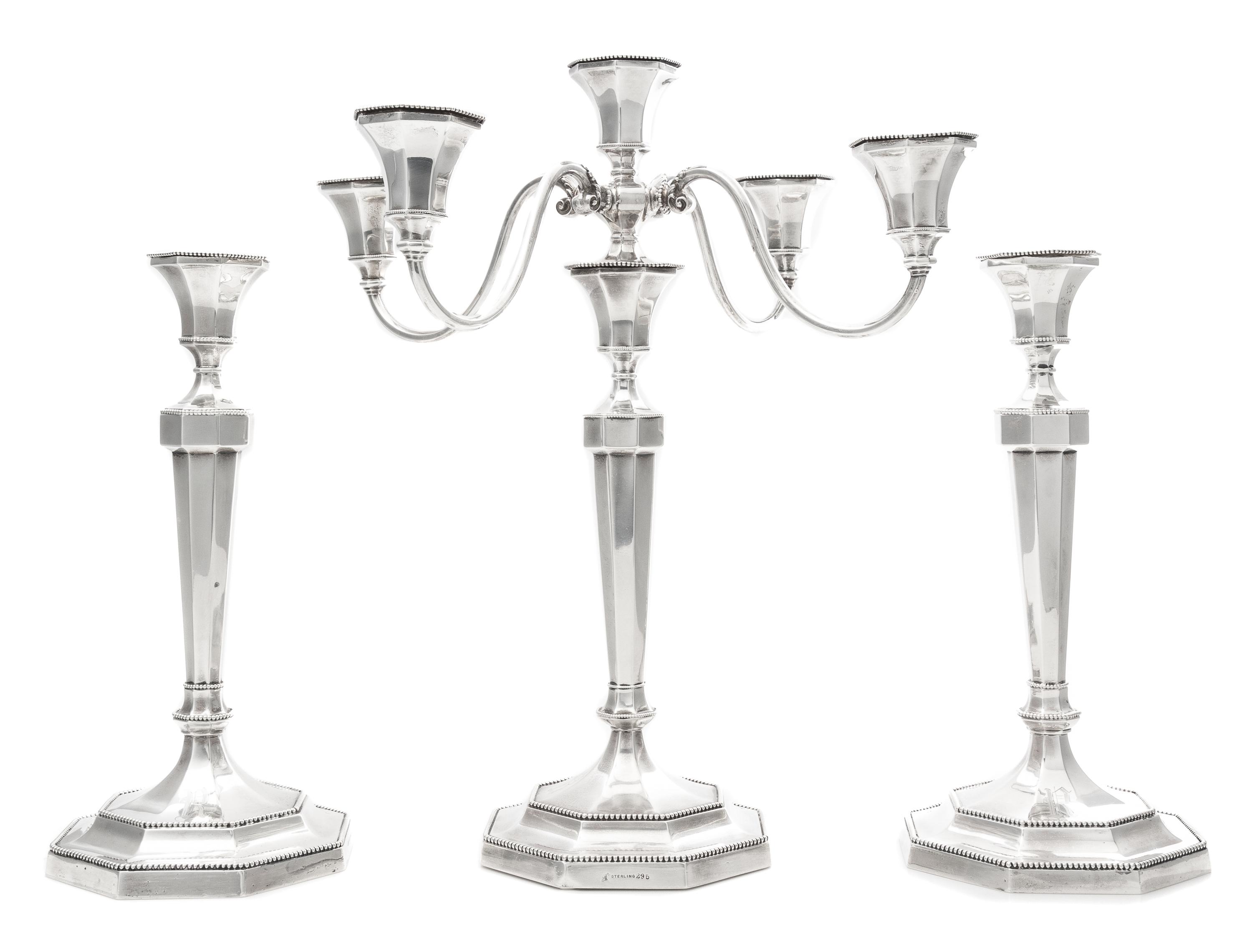 Three American Silver Candlesticks, Lebolt & Co., Chicago, IL, 20th Century, each of paneled baluster form with beaded rims and a weigh