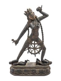 A Tibetan Lacquered Wood Figure of Vajrayogini