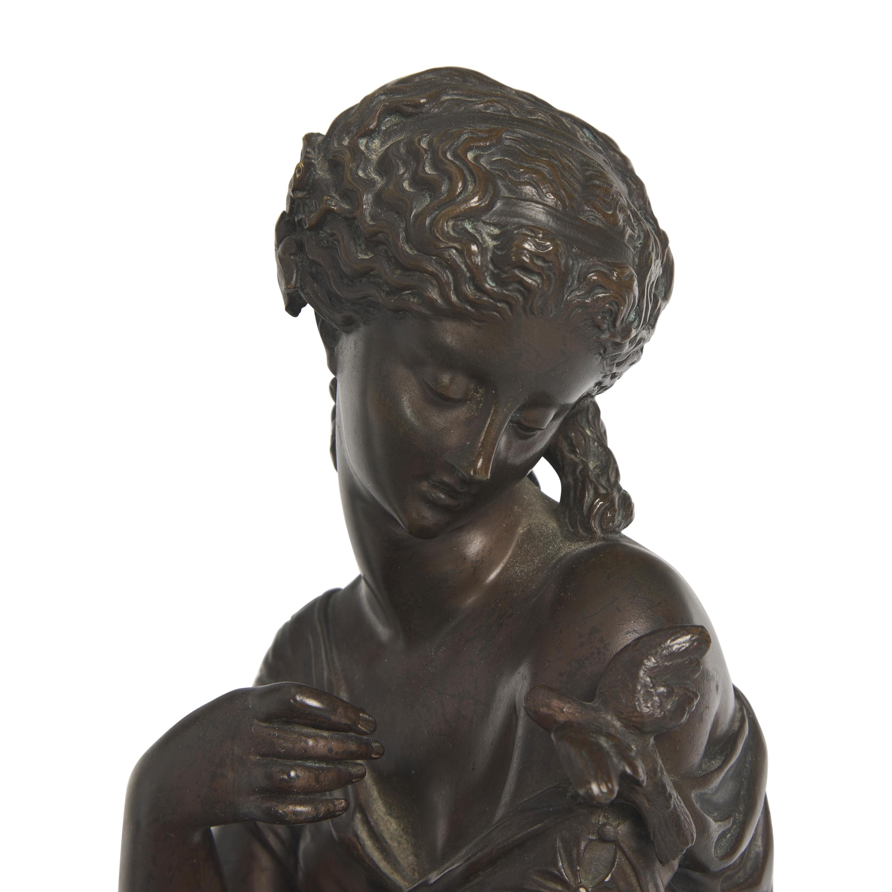 Continental School 19th Century, A Patinated Bronze Figure of a Lady with Bird
