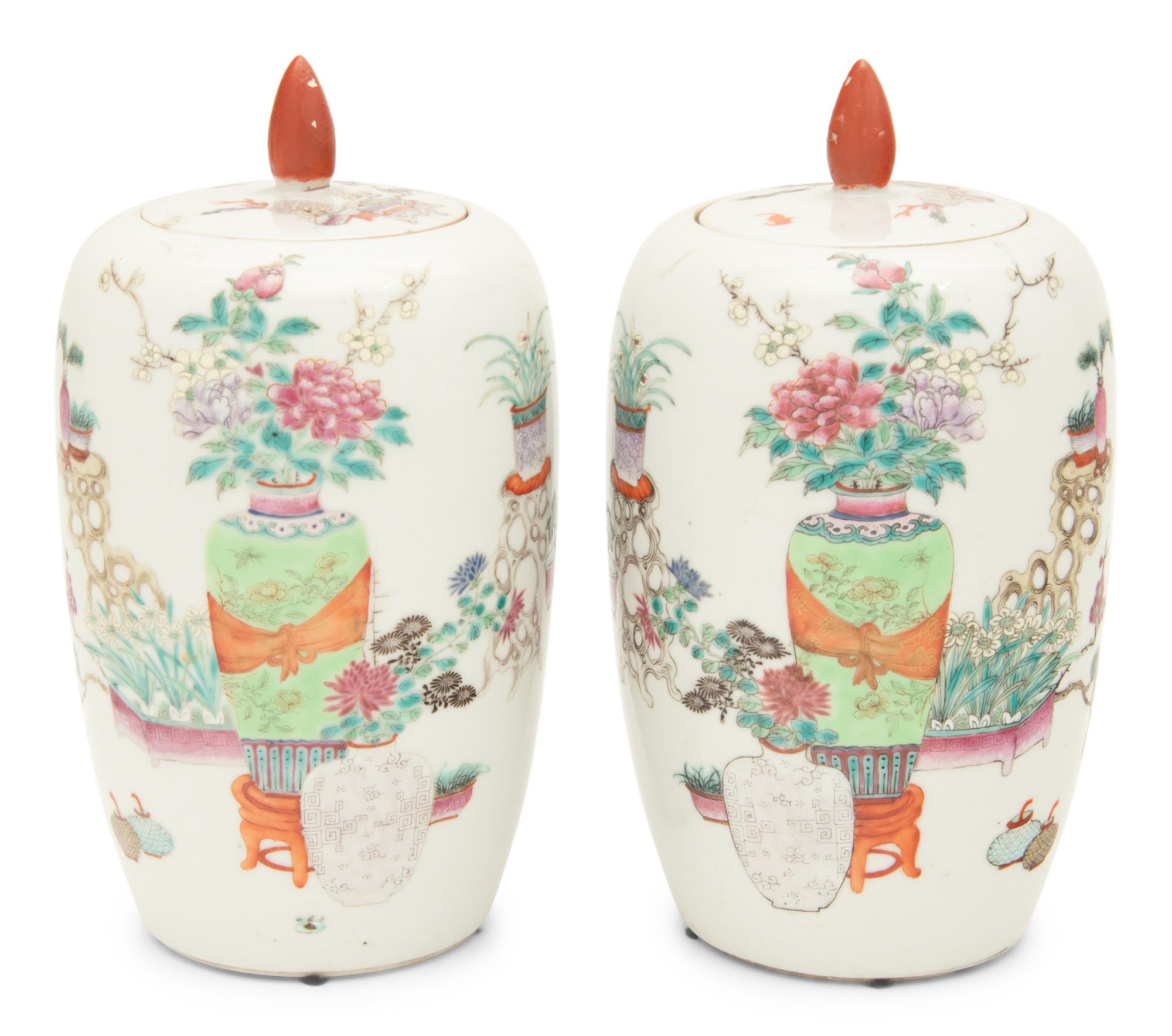A Pair of Famille Rose Porcelain Ovoid Jars and Covers
