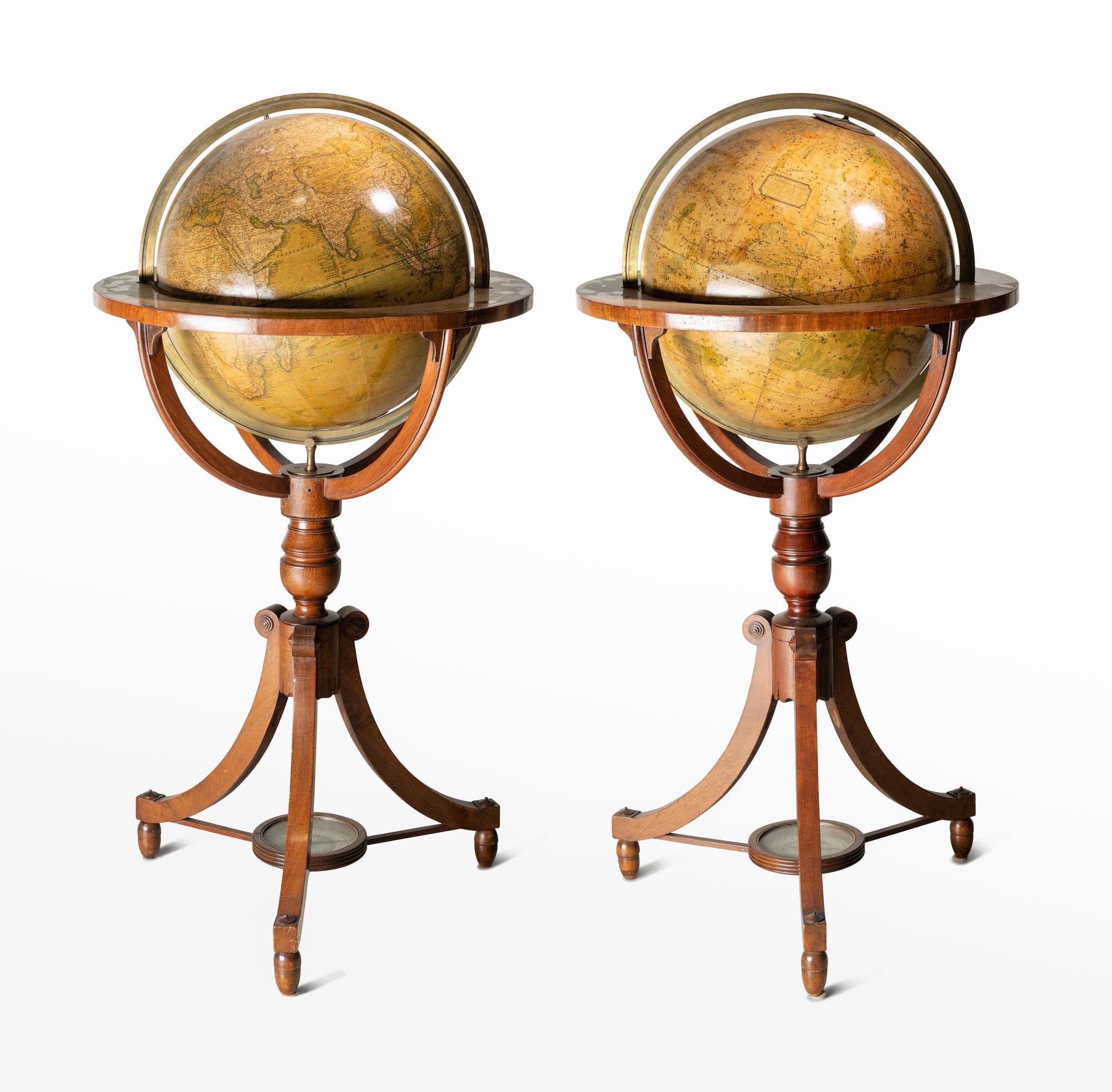 A Pair of Regency Mahogany Terrestrial and Celestial Fifteen-Inch Library Globes