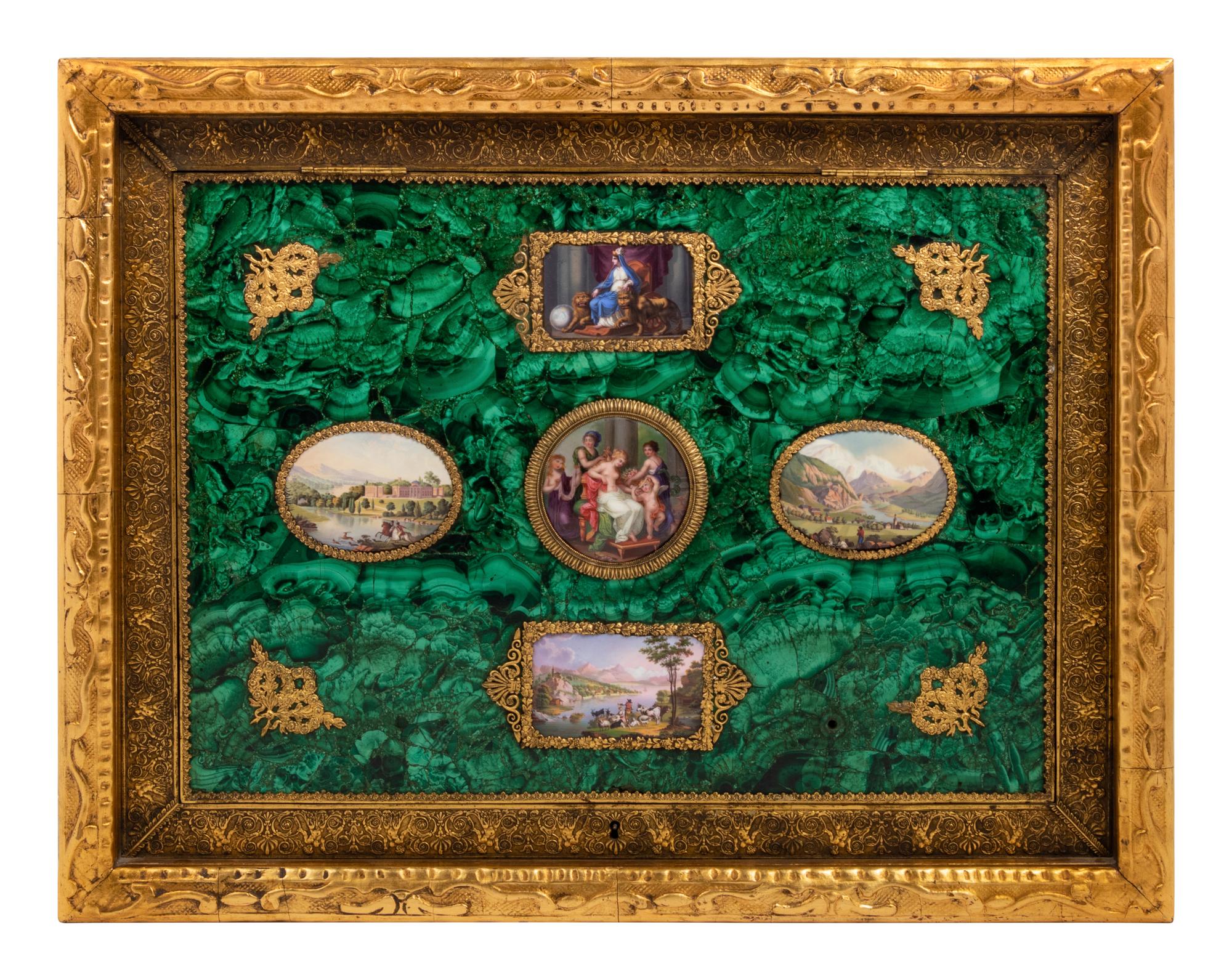 An Enamel Plaque and Gilt Metal Mounted Malachite Veneered Panel in a Giltwood Hinged Frame