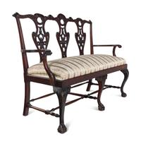 A George III Style Carved Mahogany Settee