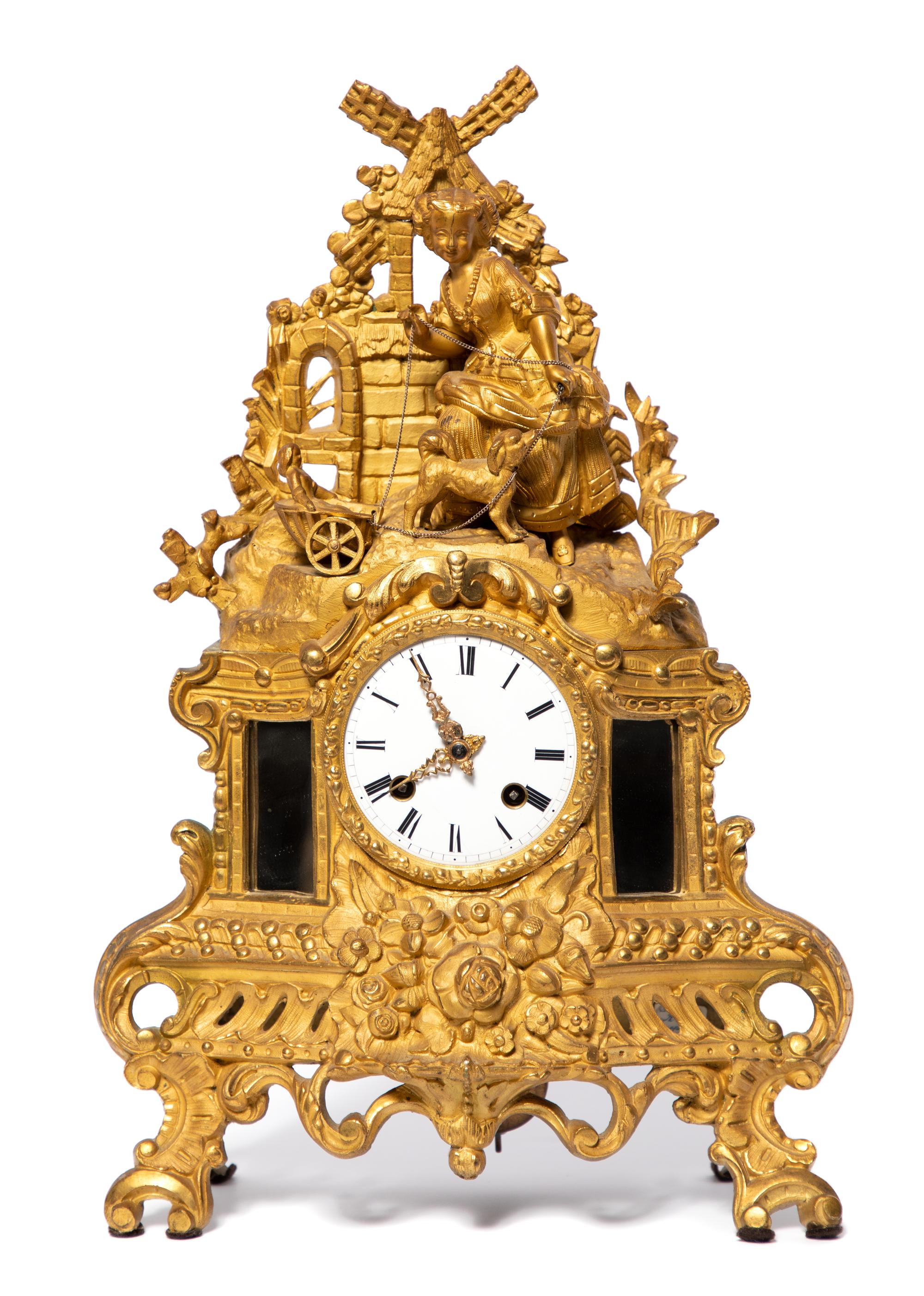A French Gilt Bronze Figural Mantel Clock