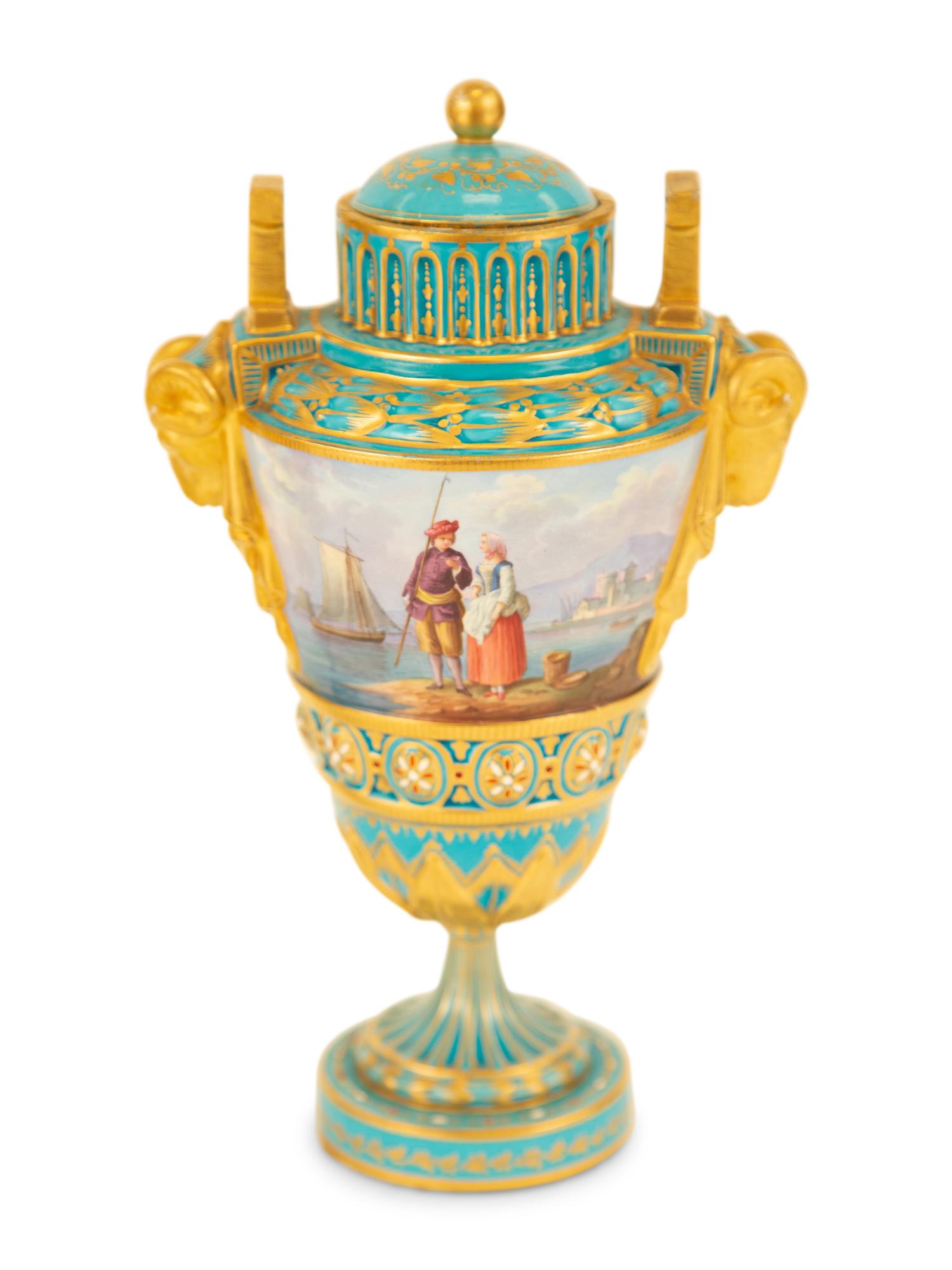 A Pair of Sèvres Style Porcelain Urns and Covers