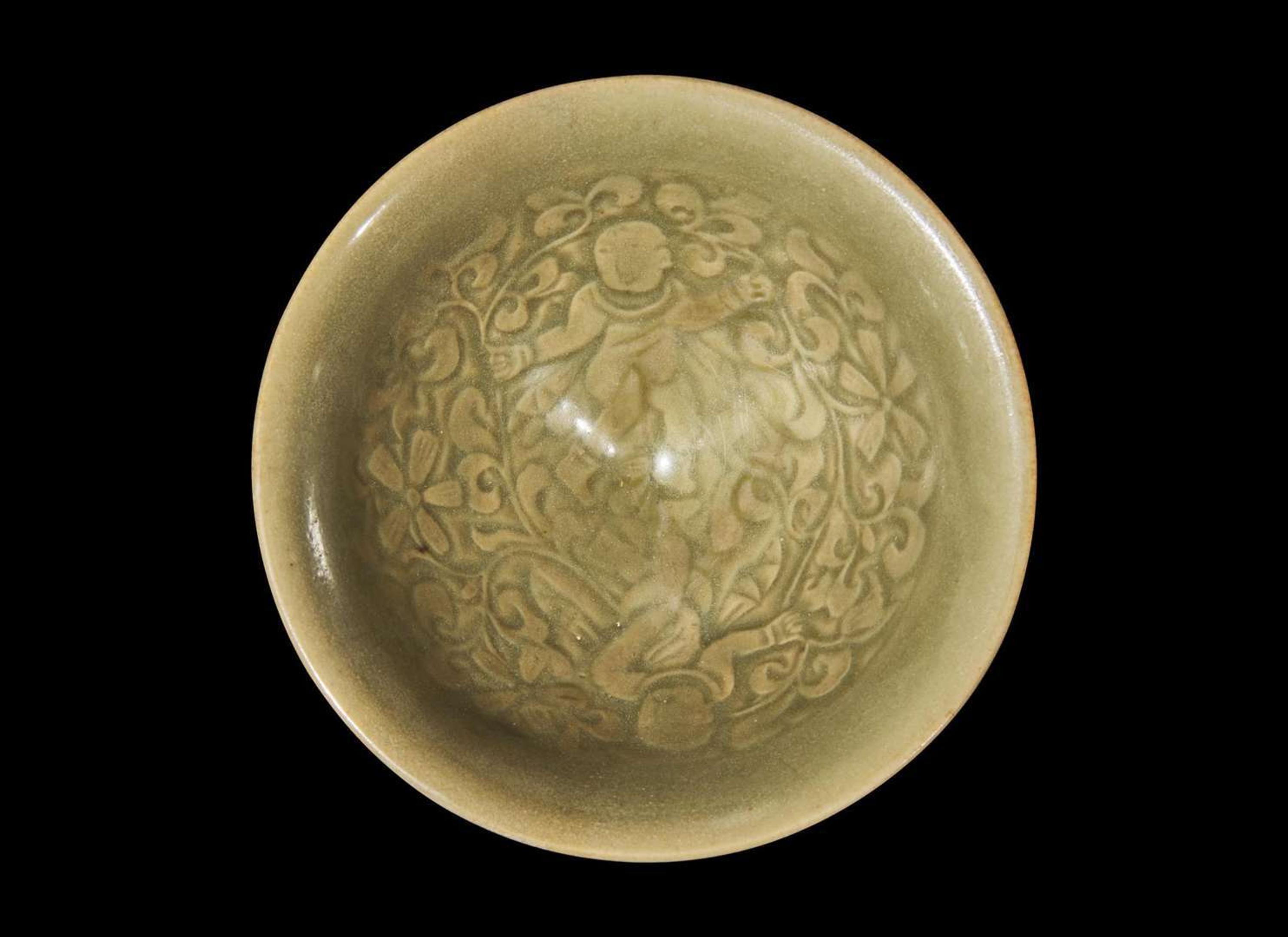 A Chinese Yaozhou celadon-glazed "Boys" bowl, Northern Song dynasty 耀州窯嬰戲盌 北宋