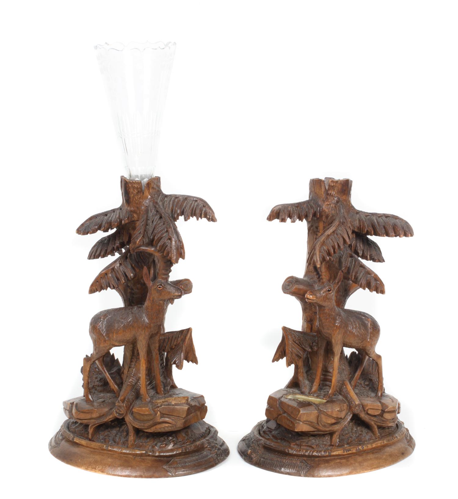 A Pair of Black Forest Style Carved Wood Candle Bases Height 13 1/2 x width 9 x depth 7 inches. — 20TH CENTURY