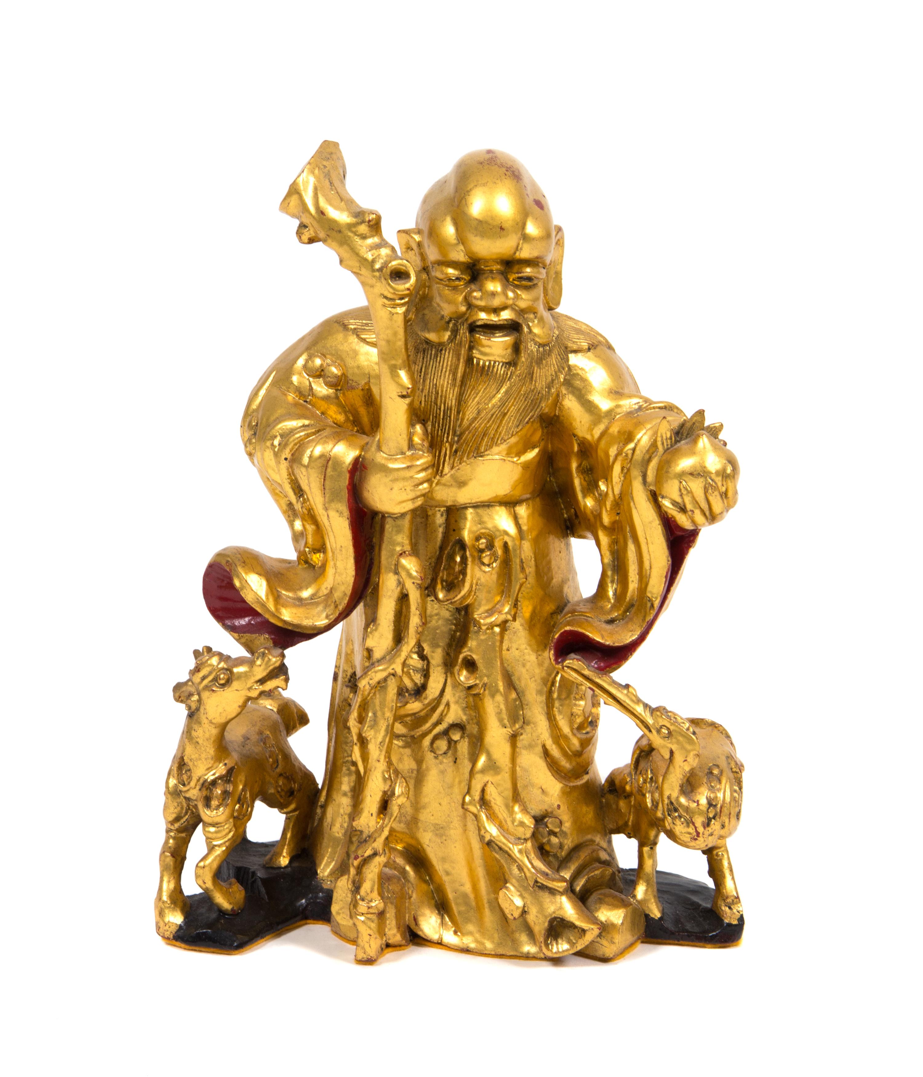 A Chinese Pierce Carved Giltwood Table Lamp Height of lamp 42 inches.