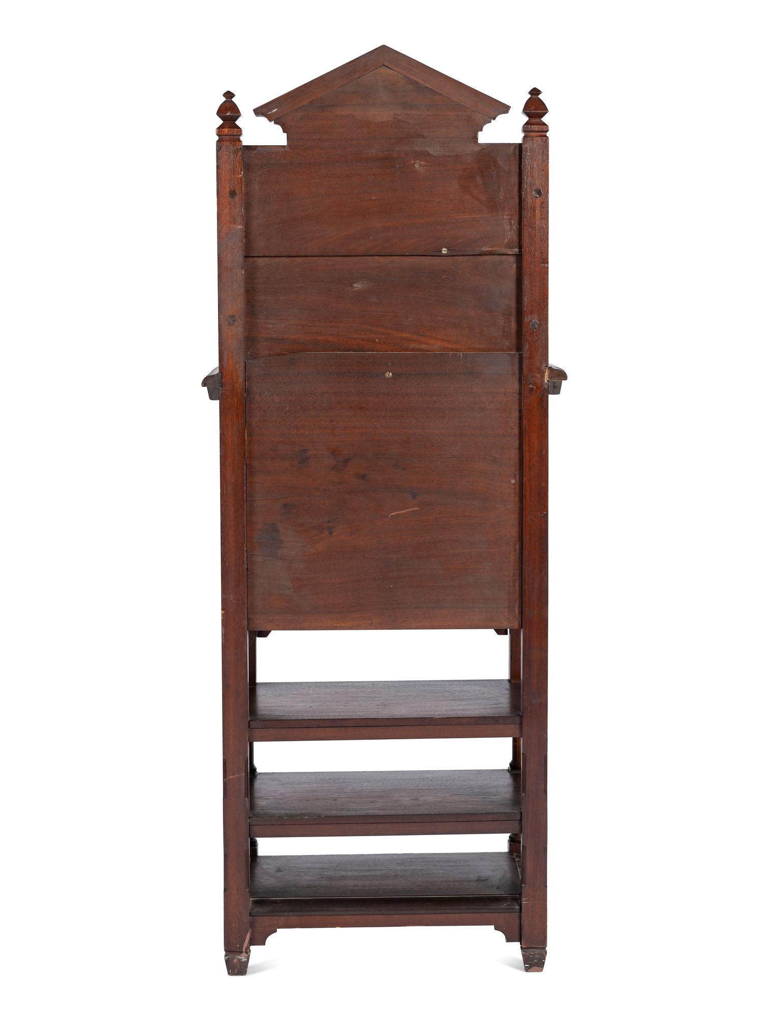 with carved floral and butterfly motifs